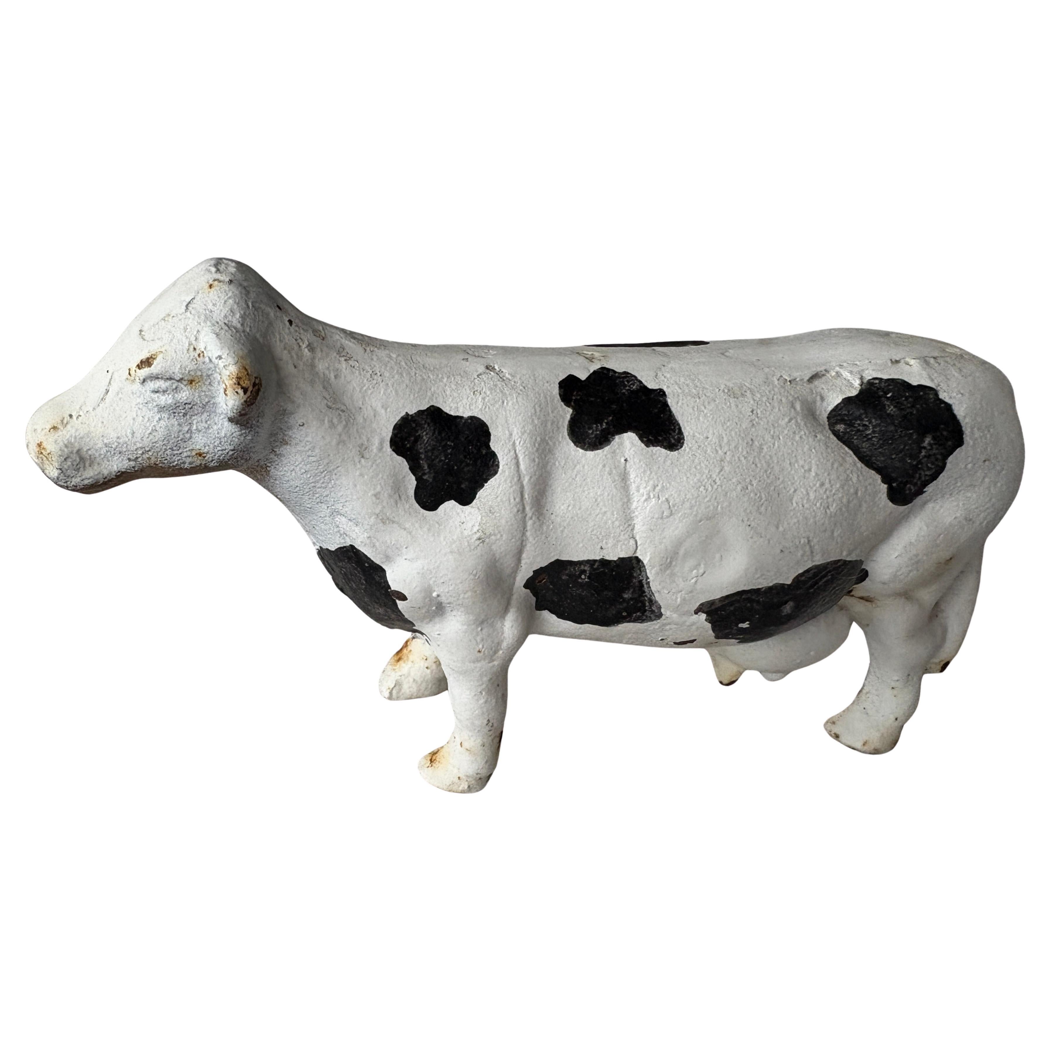 Vache originale en fonte peinte