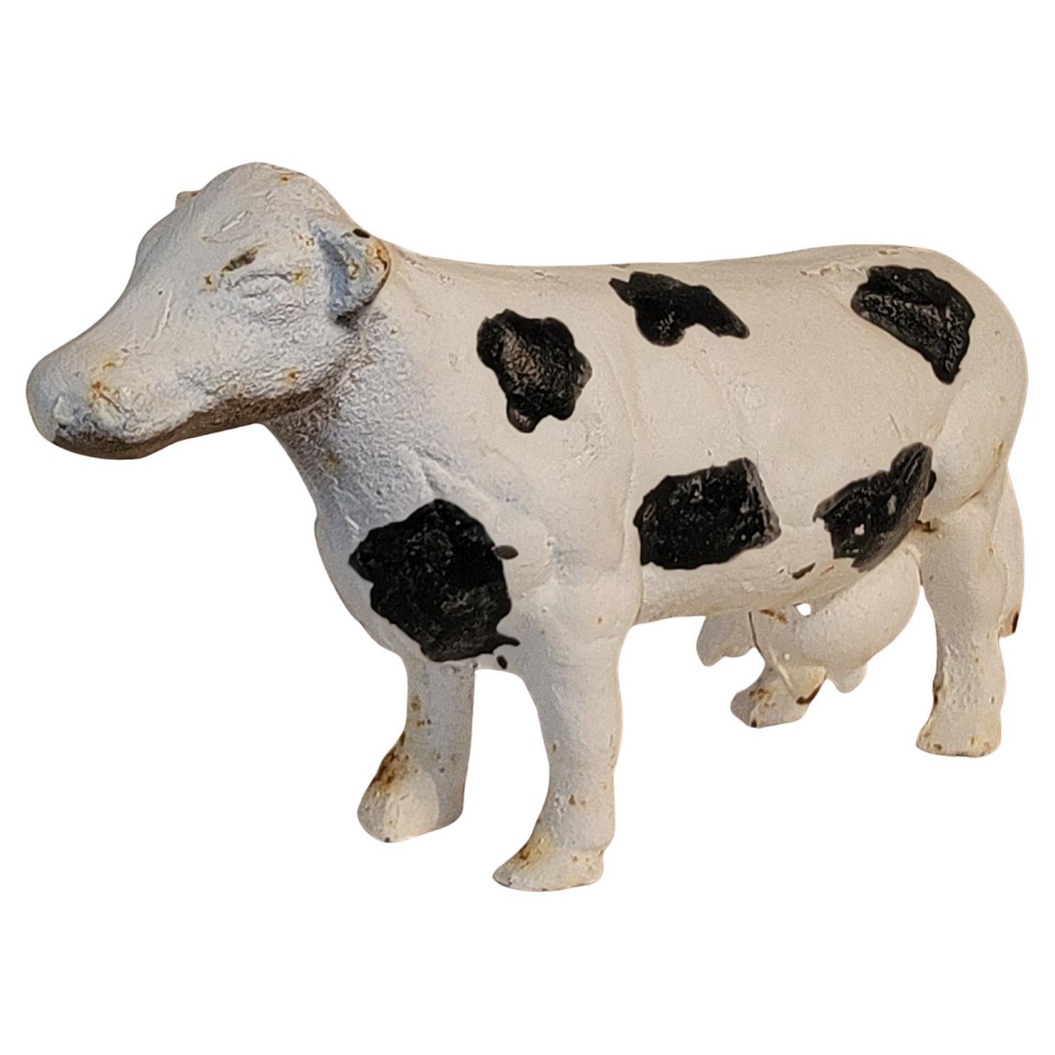Vache originale en fonte peinte