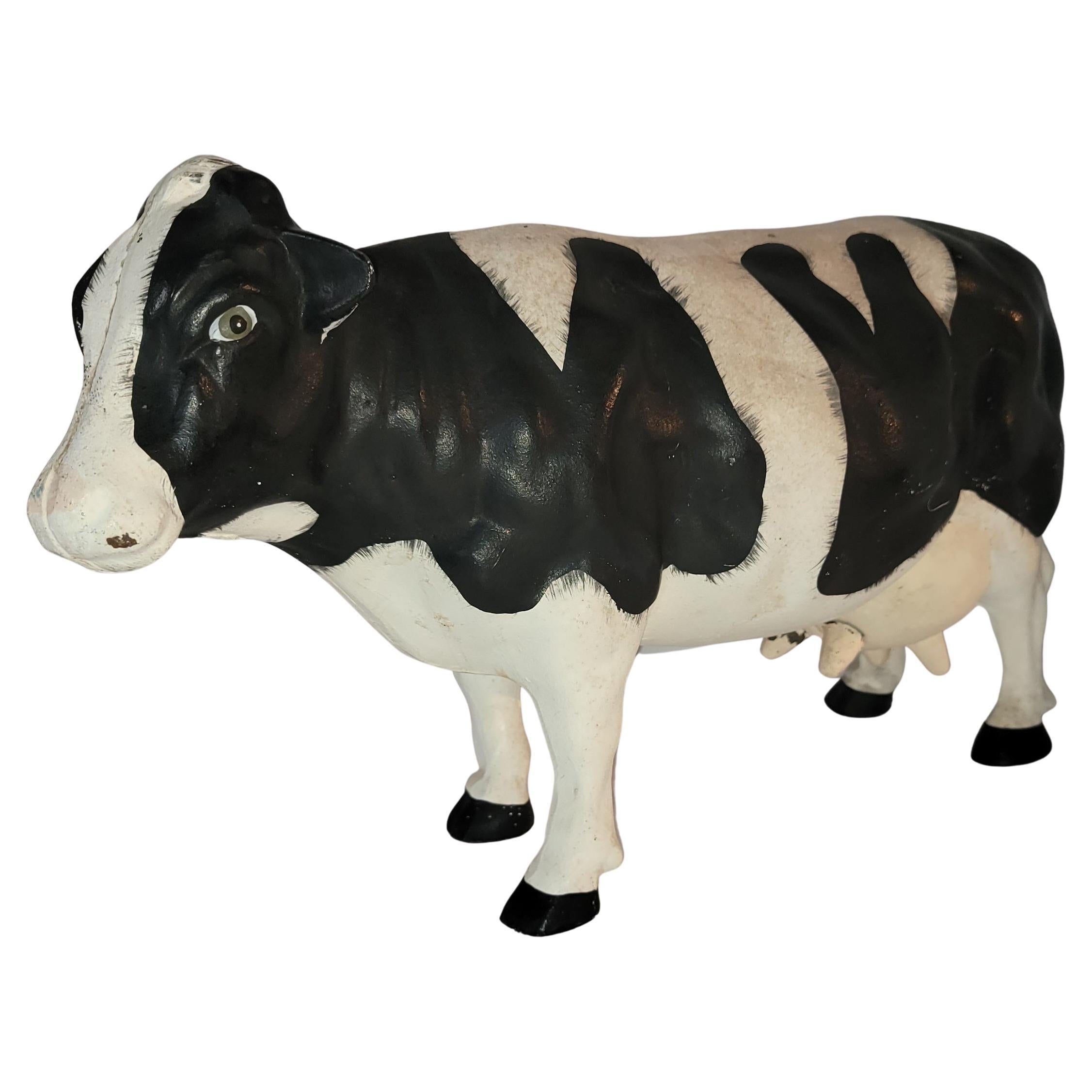 Butoir de porte original en forme de vache peinte
