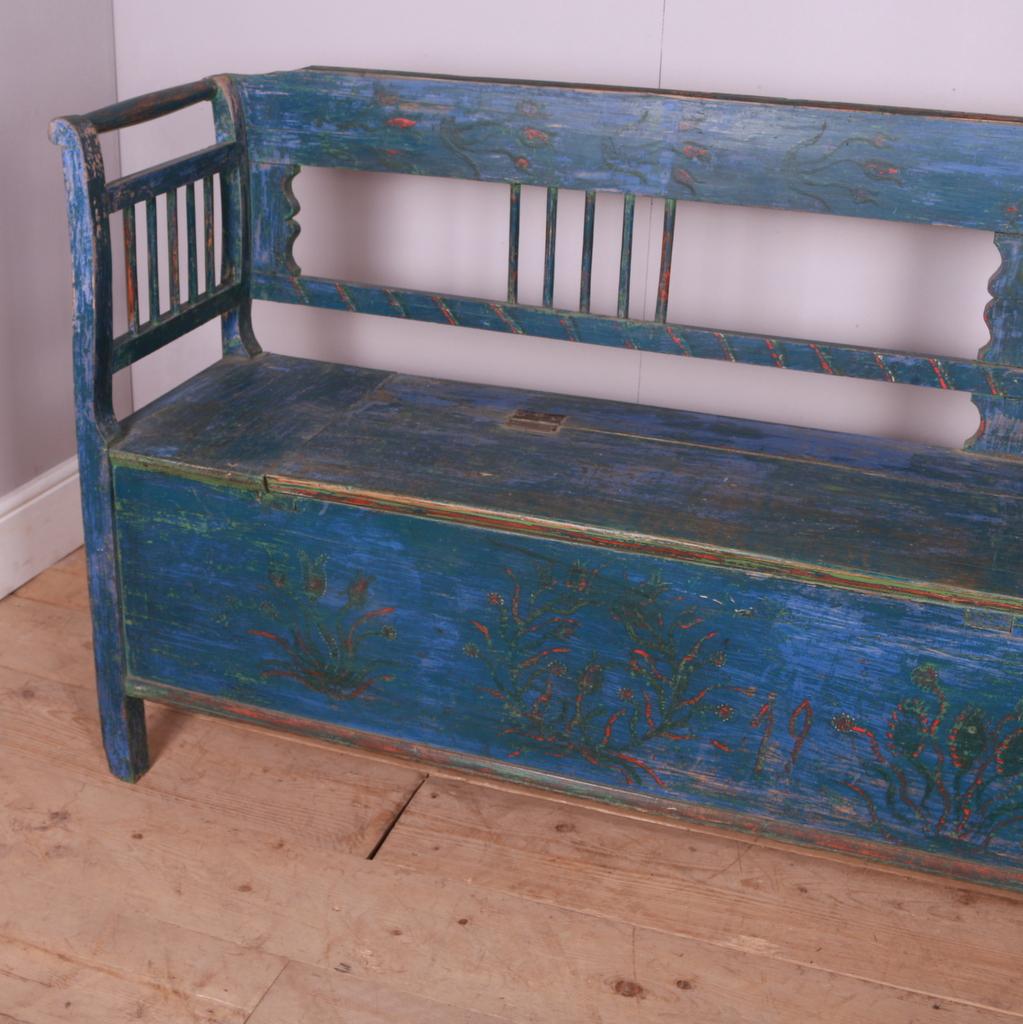 Good original painted European bench with lift up lid. 1890.

Dimensions
89 inches (226 cms) wide
18 inches (46 cms) deep
36.5 inches (93 cms) high

Seat height is 20