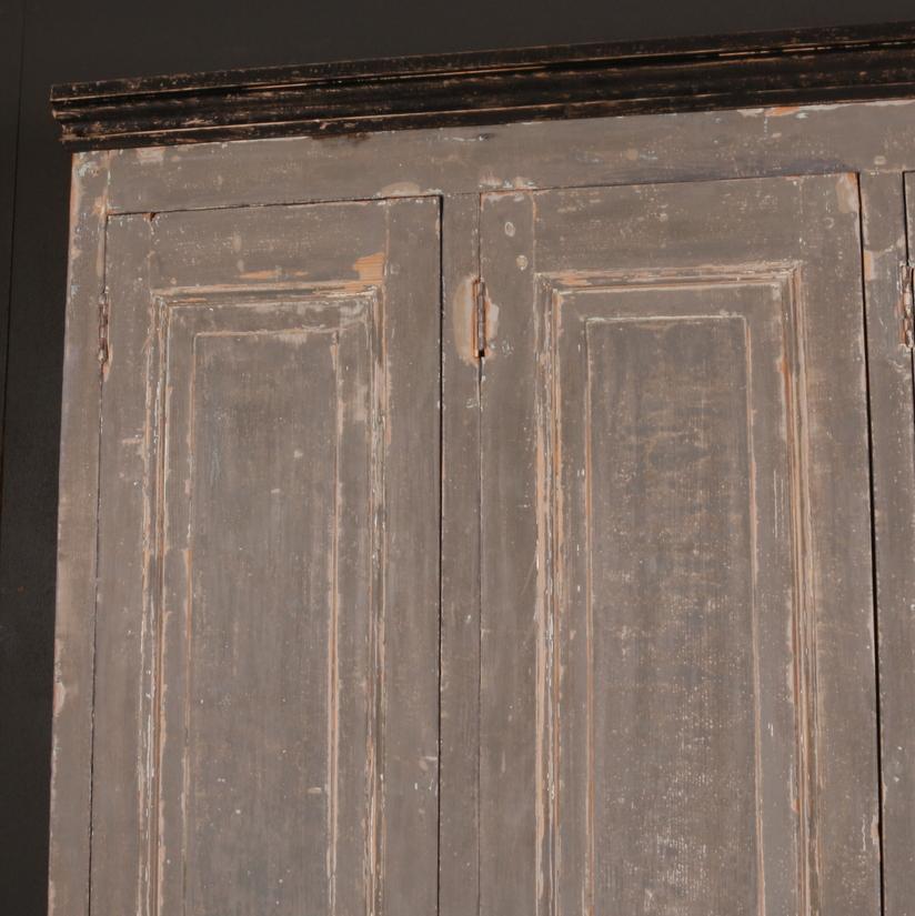 Useful French original painted 4-door cupboard with a shelved interior, 1850.

Dimensions:
64 inches (163 cms) wide
20 inches (51 cms) deep
81.5 inches (207 cms) high.

 