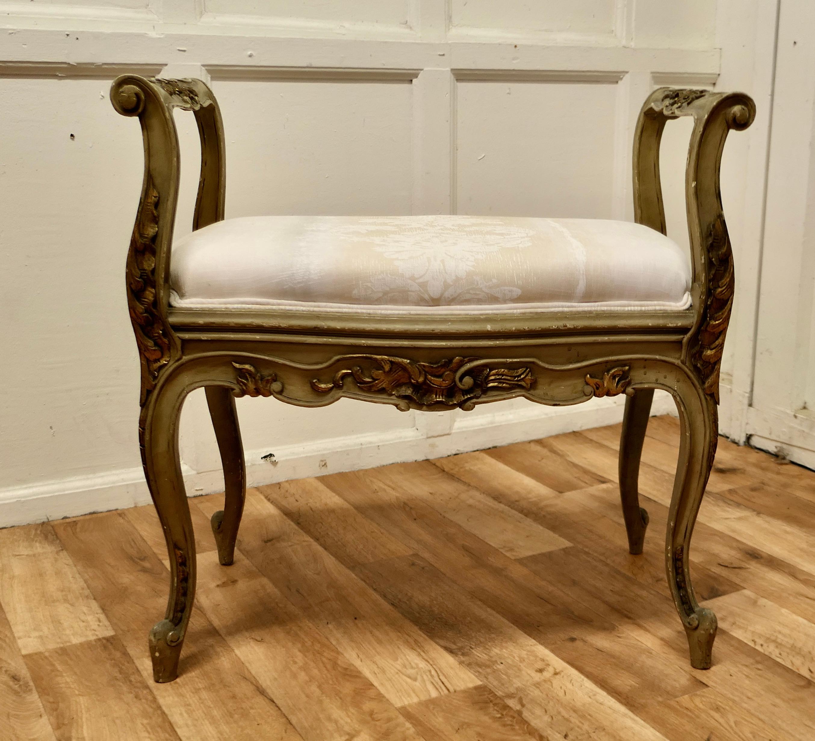 Original painted French Louis Philippe Boudoir window seat

This is a delightful Piece of Louis Philippe furniture, it has high scroll arms on either end with turned rails and it is set on cabriole legs and is shaped at the front and back
The