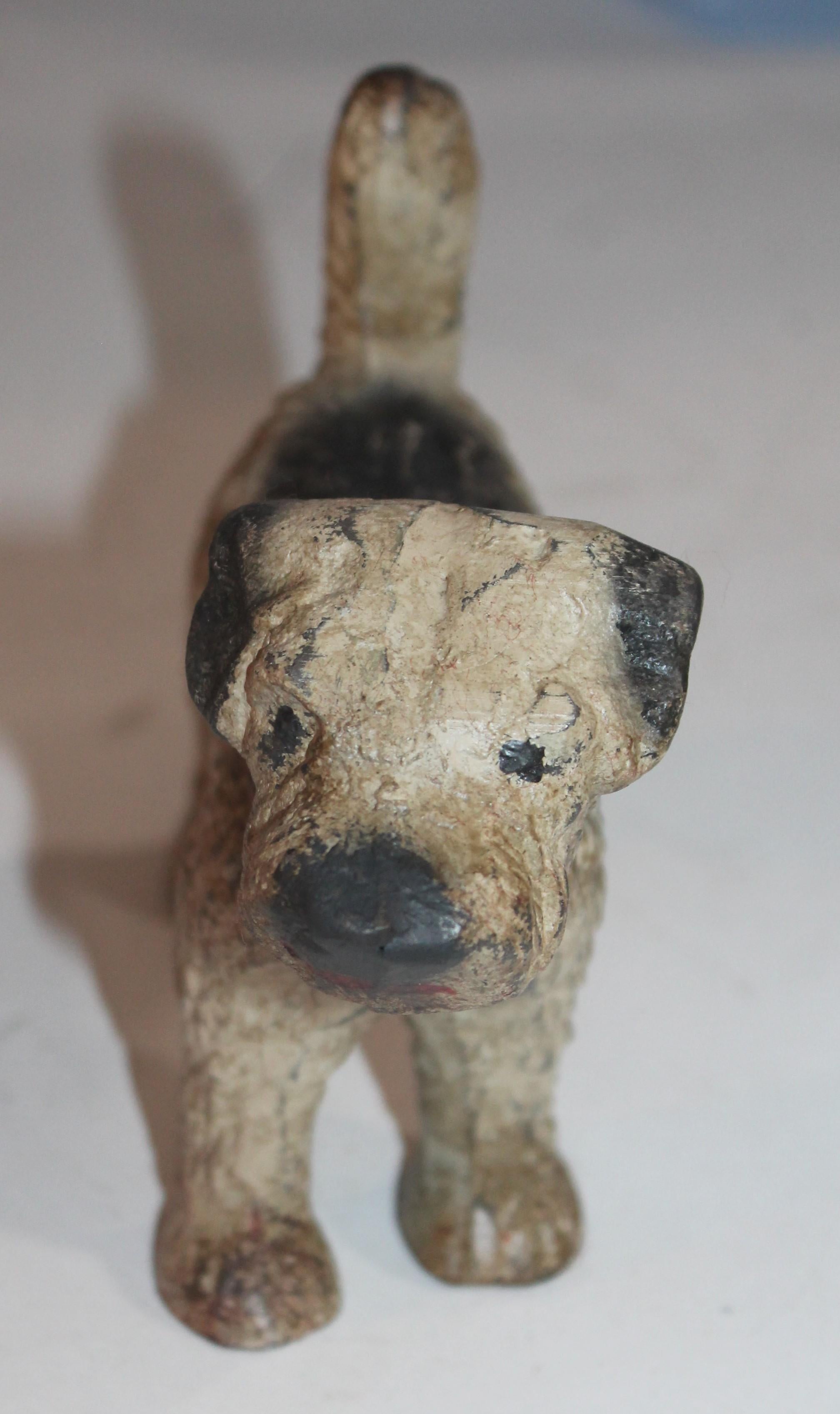 This early original painted Hubley dog, Jack Russel door stop is in good condition. This little Jack Russel dog is highly sought after and has good painted surface.