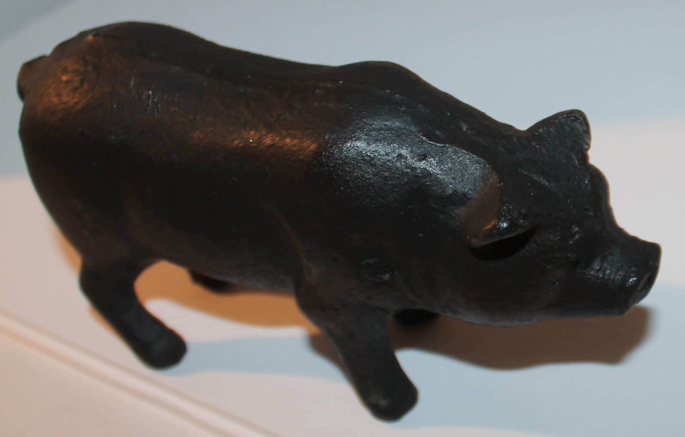 Original painted iron pig.