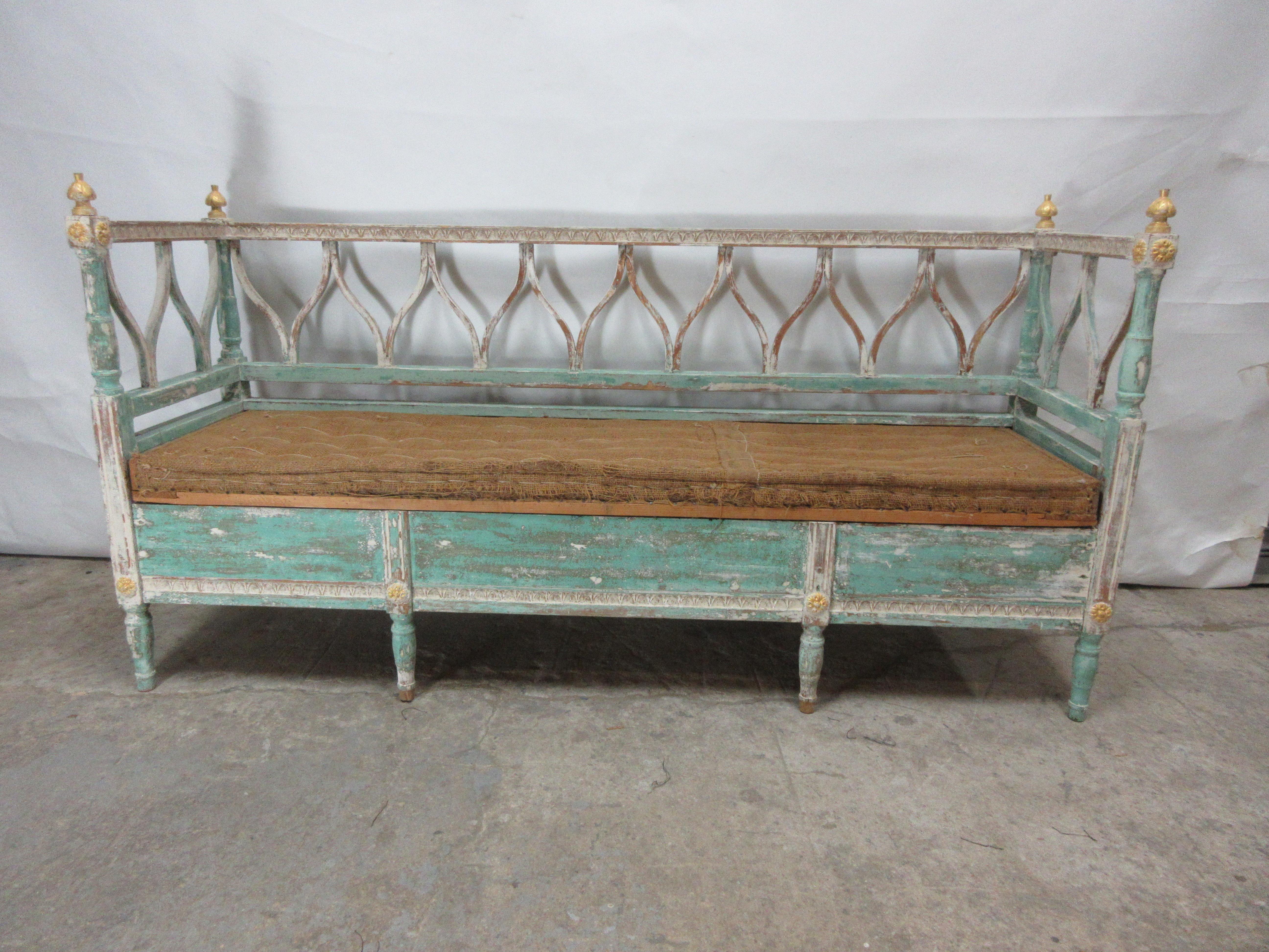 This is a 100% original painted Swedish Gustavian sofa with its original burlap seat cushion. This sofa was found at an estate auction just north of Stockholm, Sweden.
