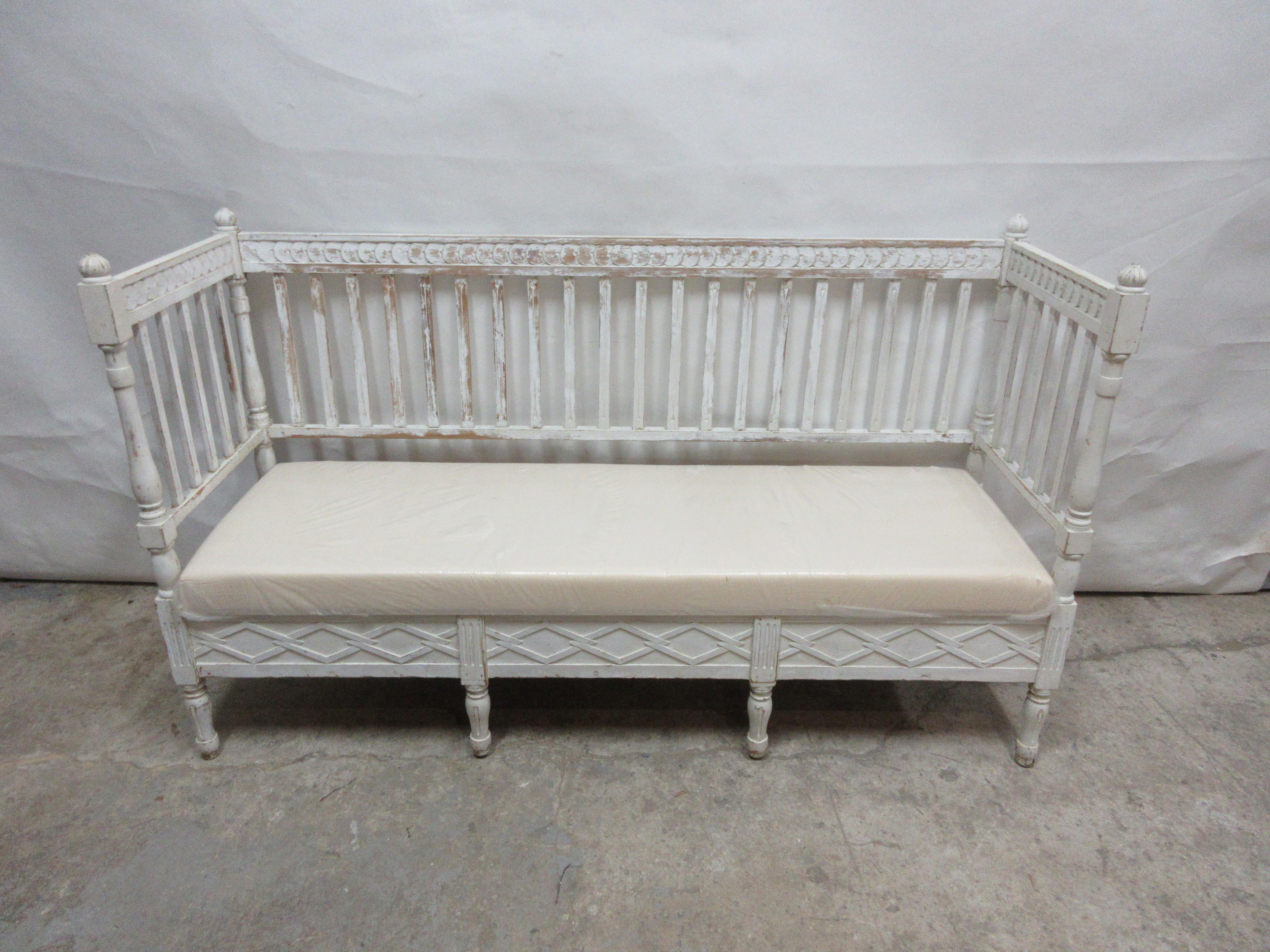 This is a 100% original painted Swedish Gustavian sofa. It has new cushion seating covered in Muslin. This sofa was found at an Auction in Mora, Sweden.