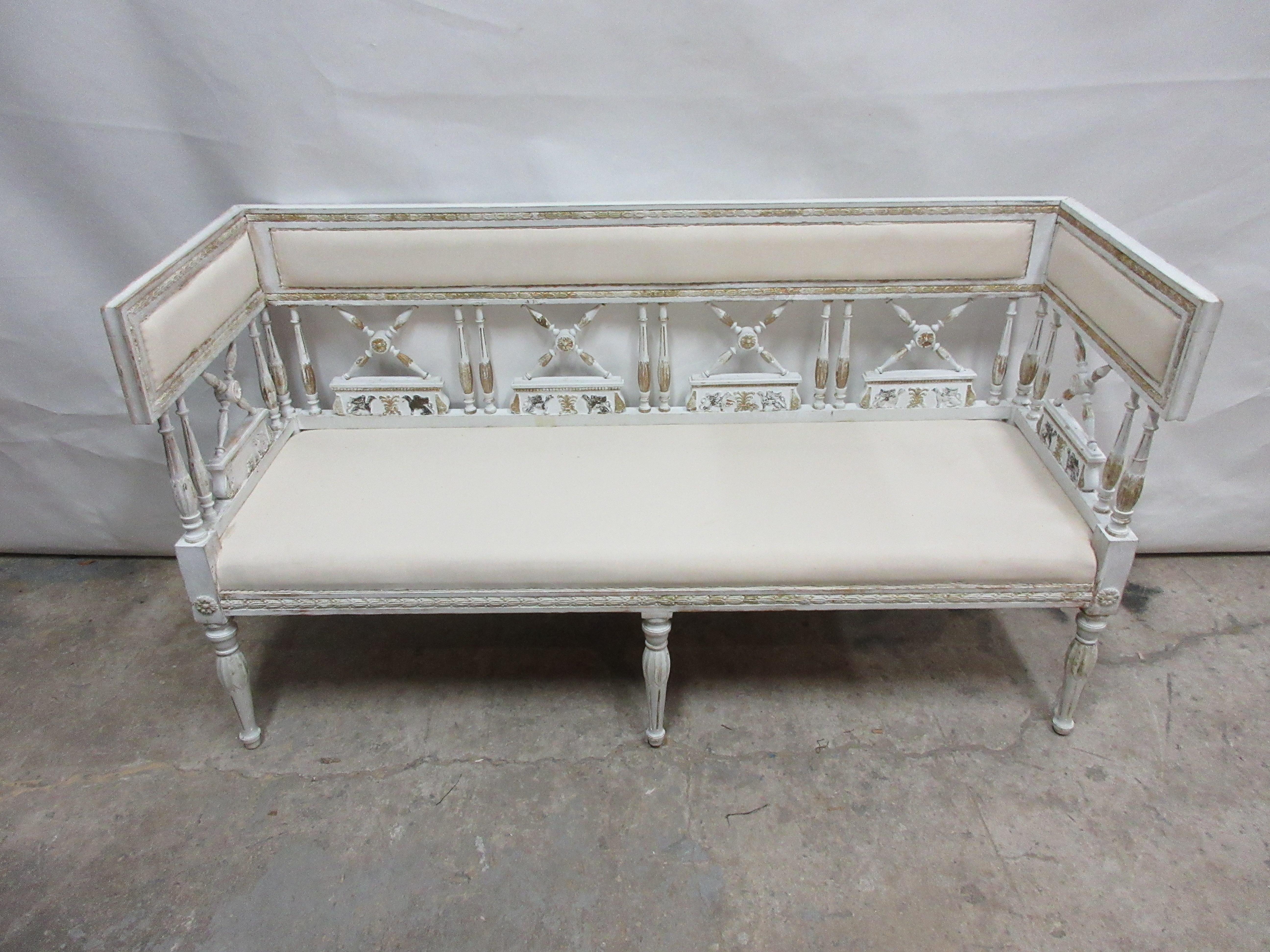 This is a 100% original painted Swedish Gustavian sofa. It has new cushion seating covered in Muslin. This sofa was found at an Auction in Stockholm, Sweden.