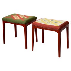 Original pair of 1930s Swedish stools with hand woven wool seats and red frame.