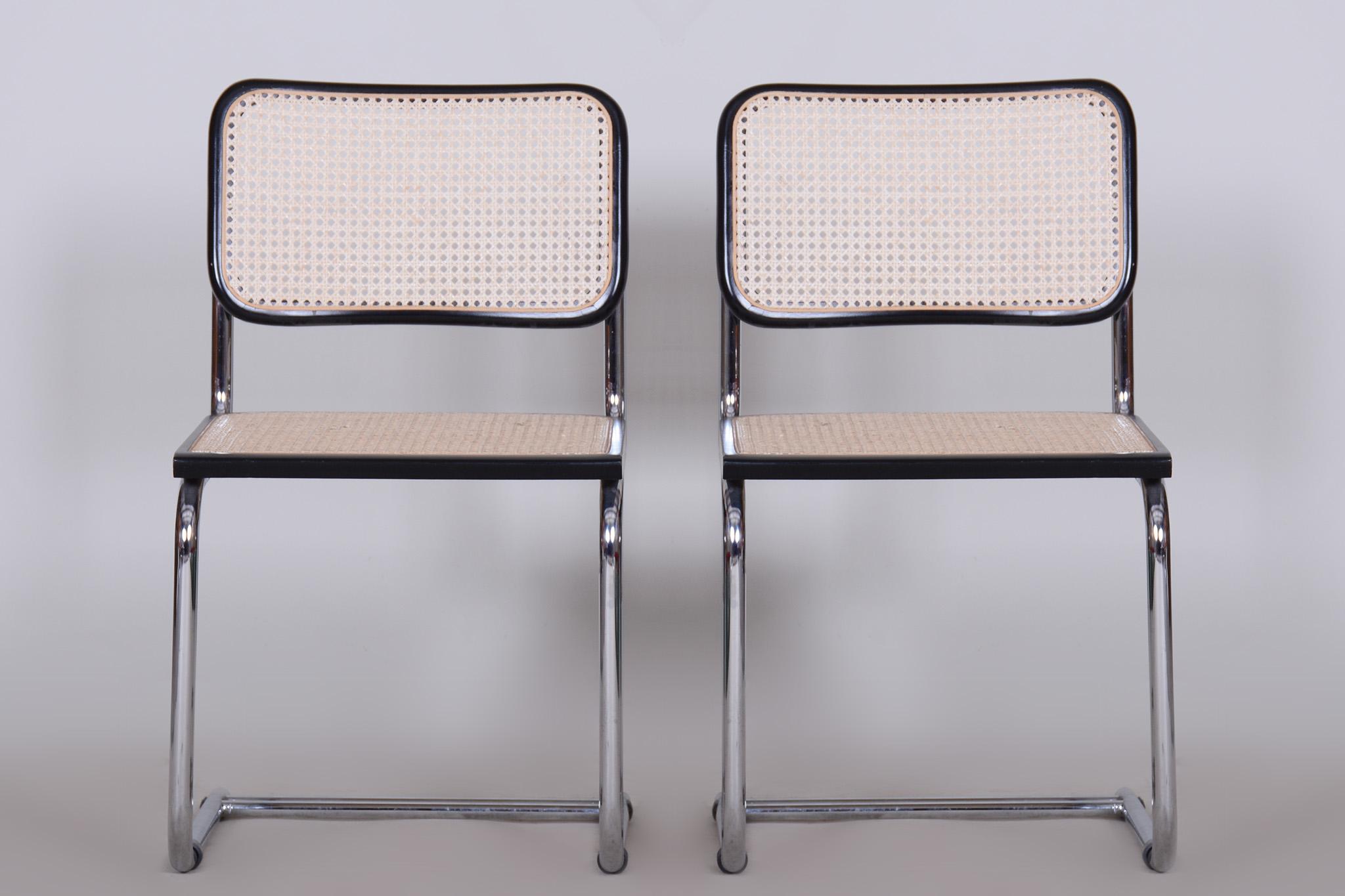 Original pair of Bauhaus chairs. Original well-preserved condition.

Period: 1960-1969
Source: Italy
Material: Chrome-plated steel, rattan, beech.

Professionally cleaned.