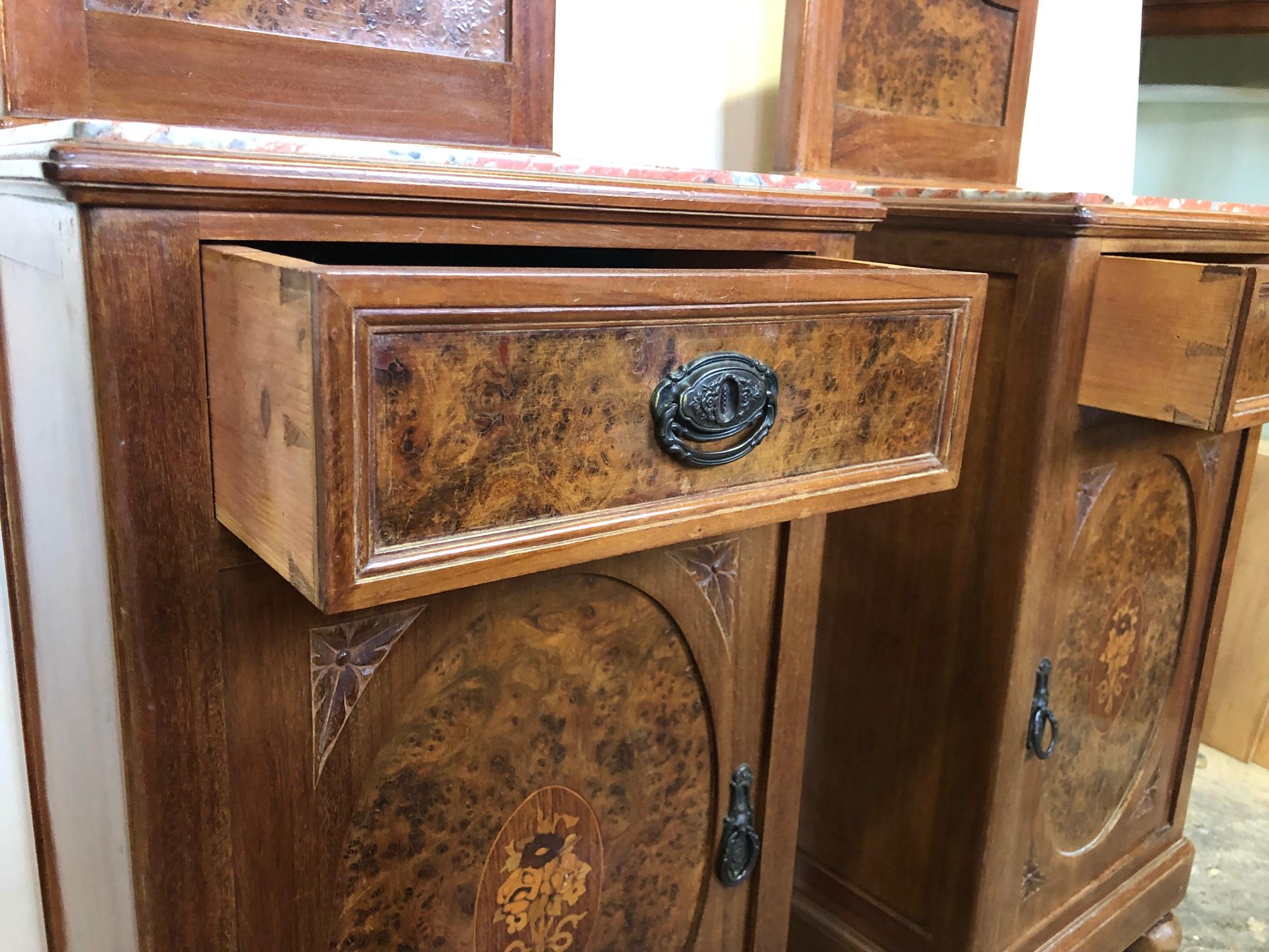 Pair of original 1960 Italian night stands in walnut and with granite marble top. 
All the carvings on the solid walnut parts were done manually.
They have a nice design and are very practical.
Total height with backsplash is 115 cm. The
