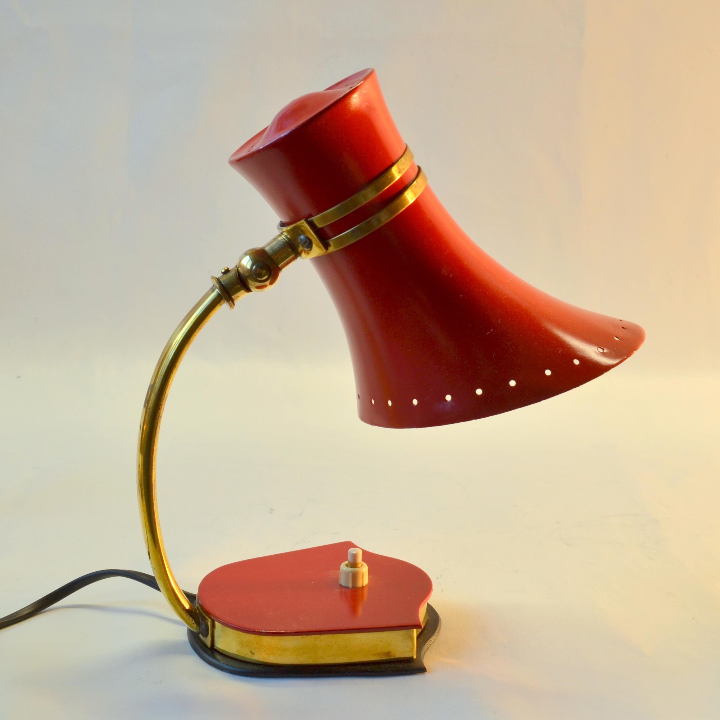 Pair of original by Stilnovo Mid-Century Modern Italian red & yellow enameled aluminum & brass bell shape table lamps with adjustable joints to angle the light source. These Italian enameled  were produced in the 1950's-1960's and are vintage in