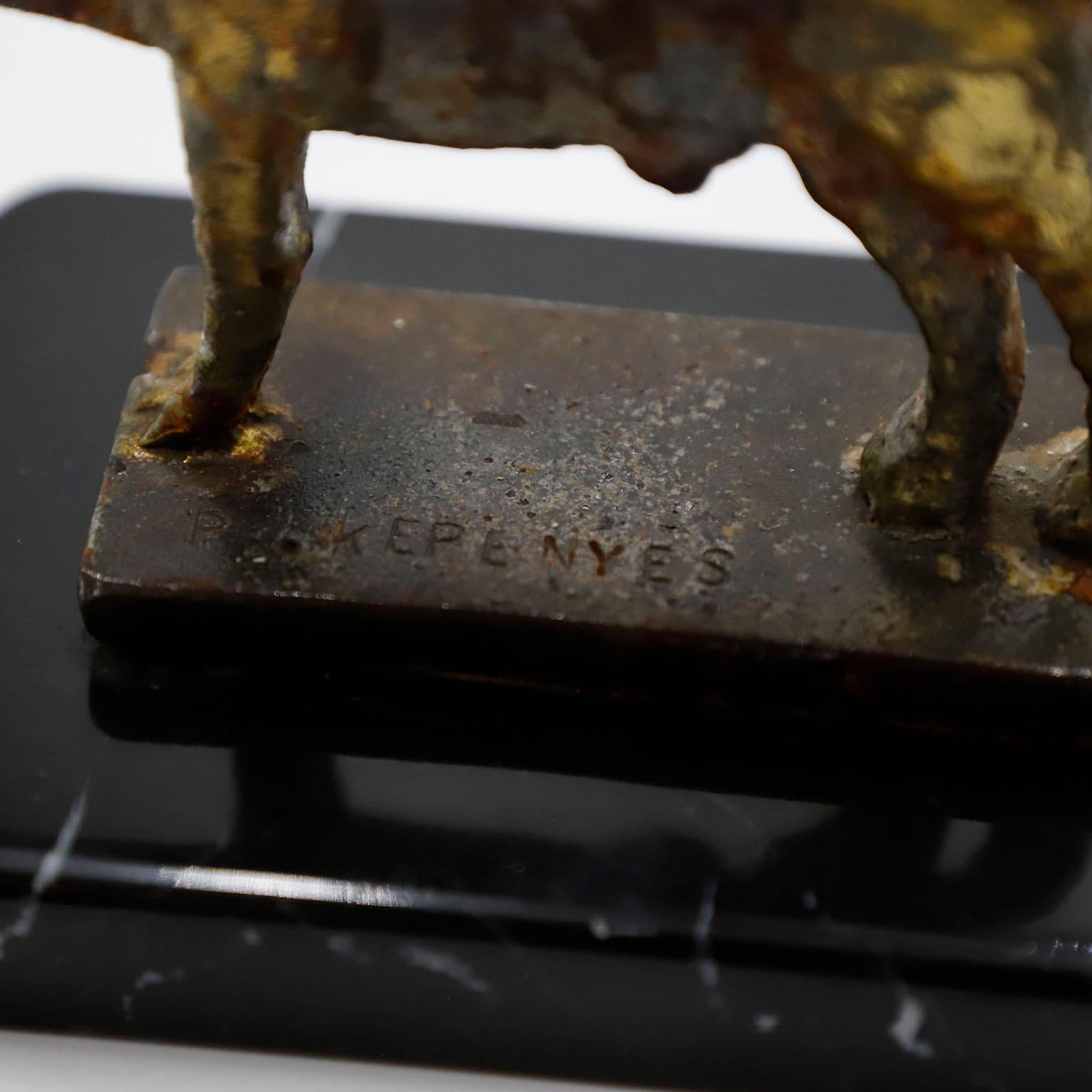Circa 1970. We offer this Pal Kepenyes Lion Sculpture made in steel and black marble signed. 
Pal Kepenyes was a Hungarian artist and jewelry designer known for his unique and innovative designs. He was born in Budapest in 1926 and began his career