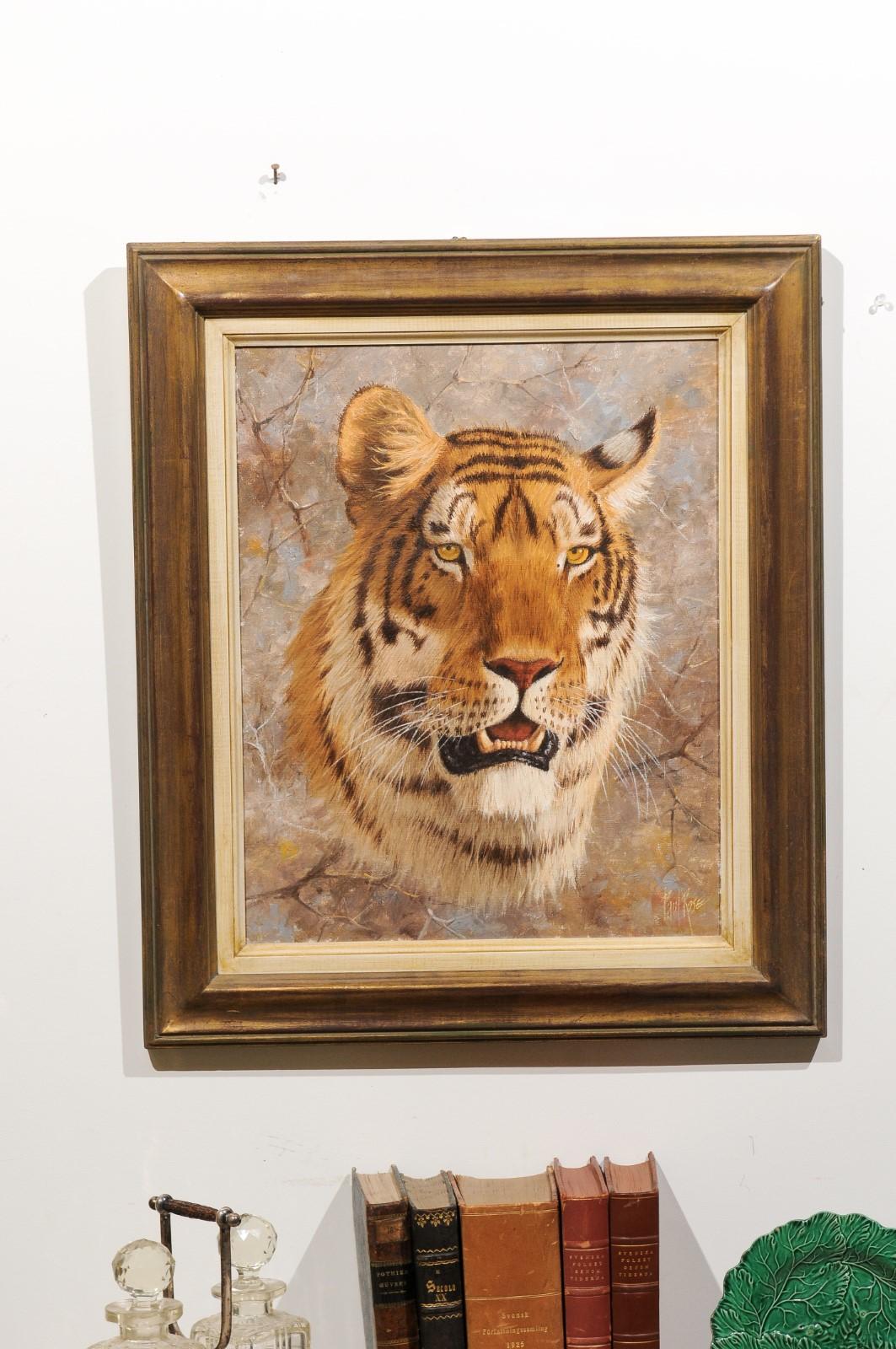 An original Paul Rose framed wildlife painting from the 20th century, depicting a tiger head. Standing out beautifully on an abstracted background accented with small branches, this exquisite painting depicts a tiger looking slightly past us.