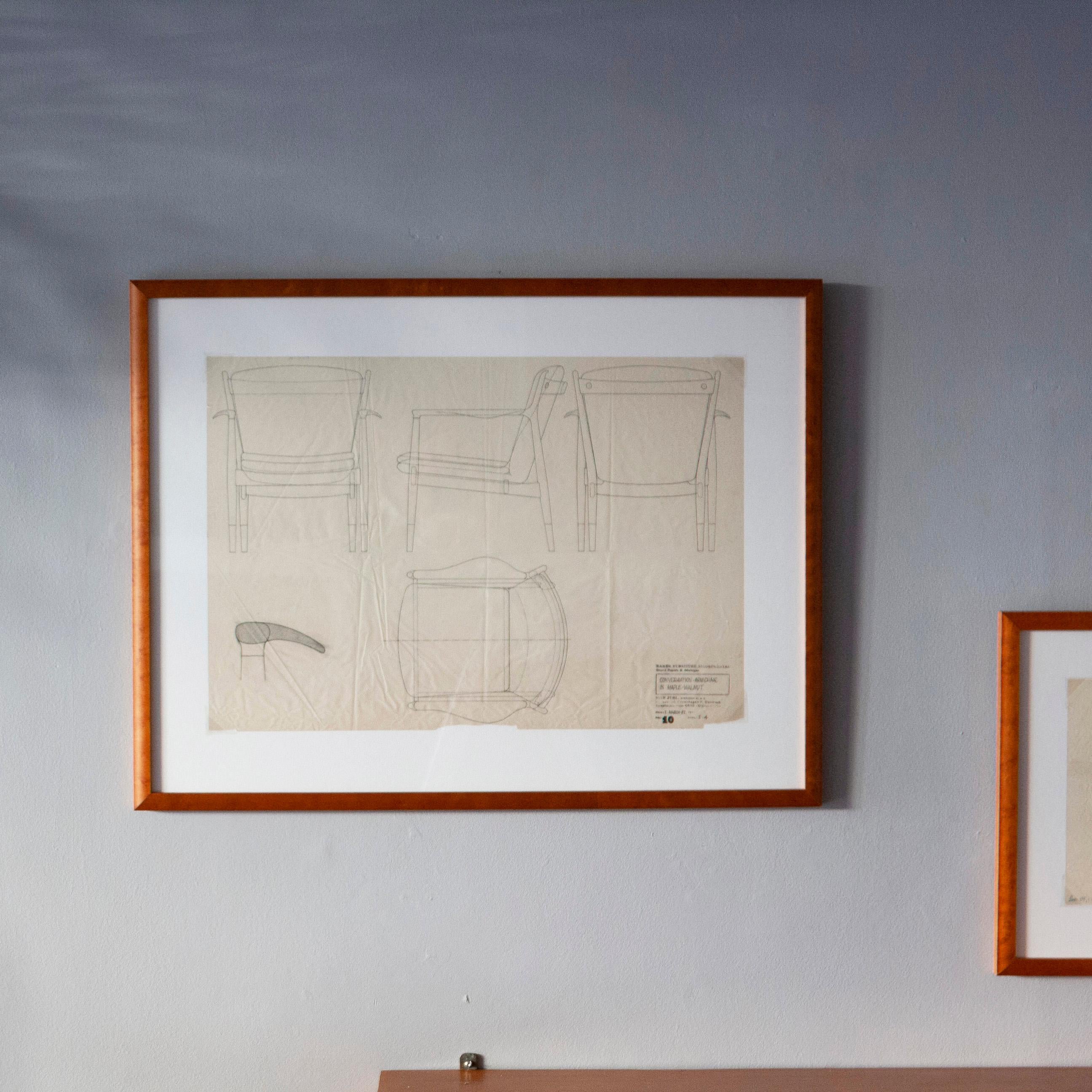 This is an example of a hand-drawn 1:4 scale orthographic drawing of the ‘Conversation Armchair in Maple-Walnut’, 1st March, 1951 by Finn Juhl. The drawings depicts the font view, side on, back, top view and the detail of the armrest.The drawings