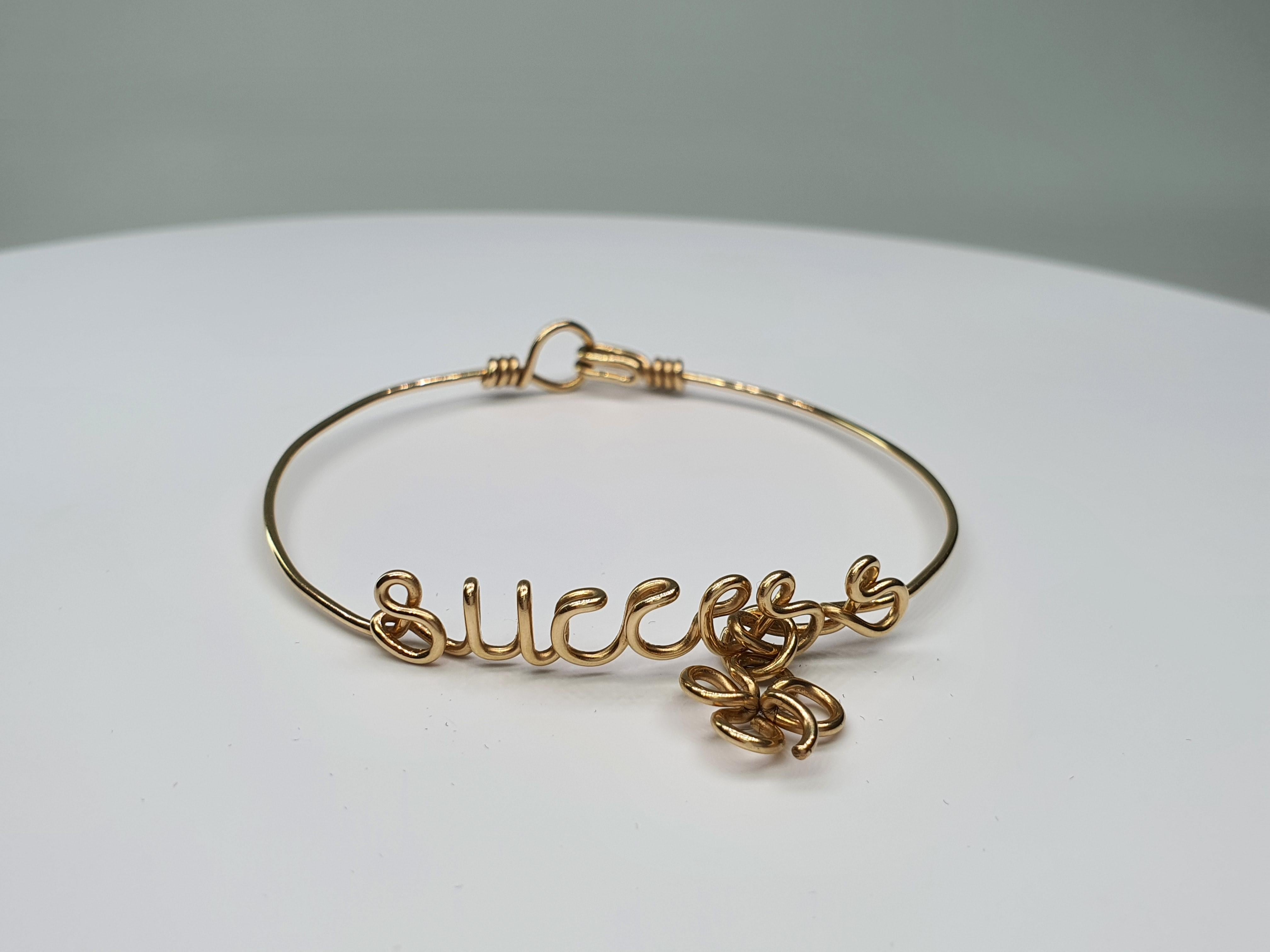 Original Personalised Gold Filled Yellow 14K Wire Bangle Bracelet 

These personalized jewelry are made out of 14K yellow or pink goldfilled wire, sterling silver. Each piece is handcrafted.
So many feelings and emotions can be expressed in words! 