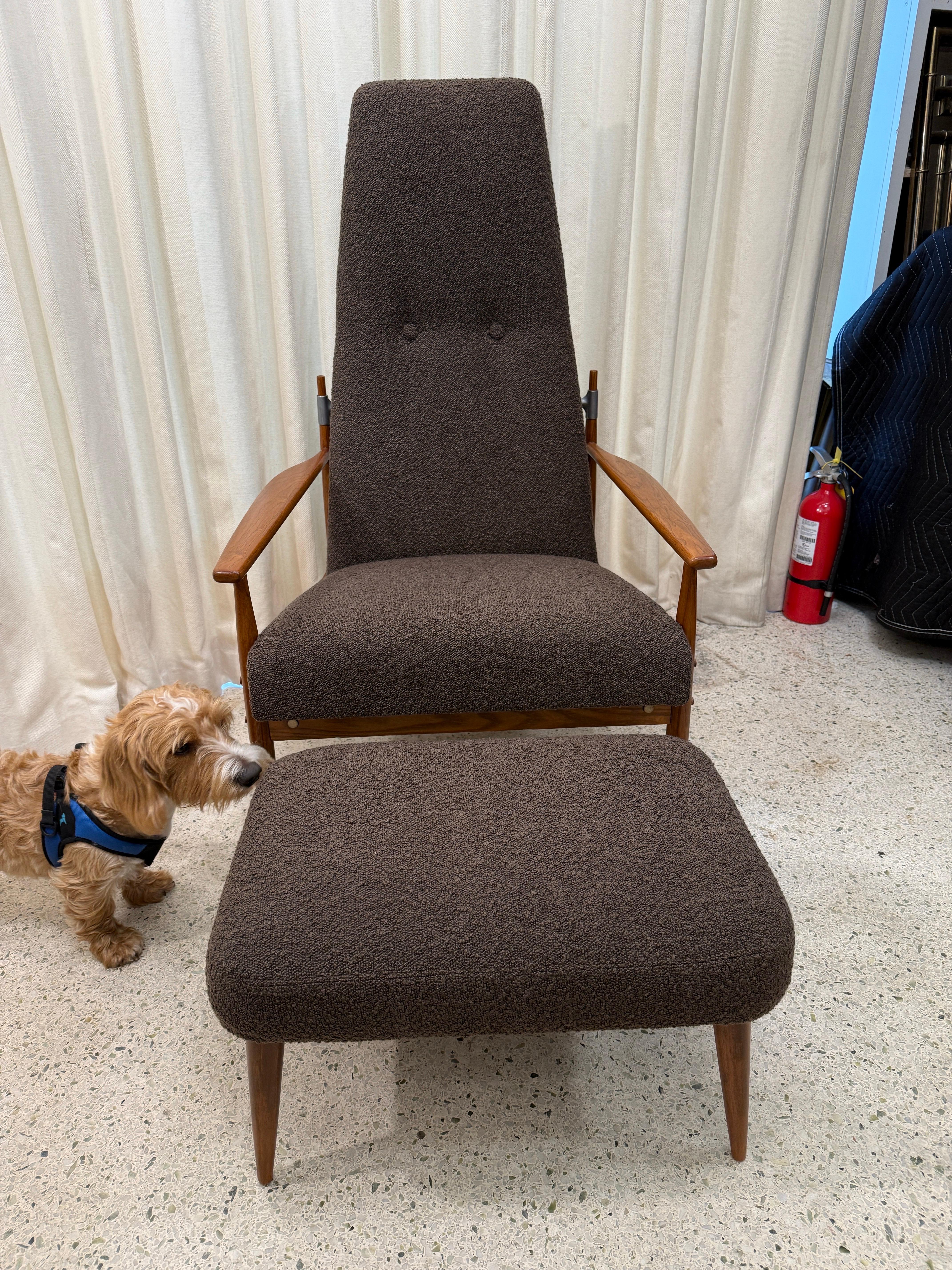 Enjoy a luxurious iconic vintage designed chair + ottoman by Peter Hvidt, Denmark 1960's.  Newly reupholstered in subtle brown boucle fabric over walnut, this chair is very sculptural with a high backrest, and extra-thick padded seat for superior