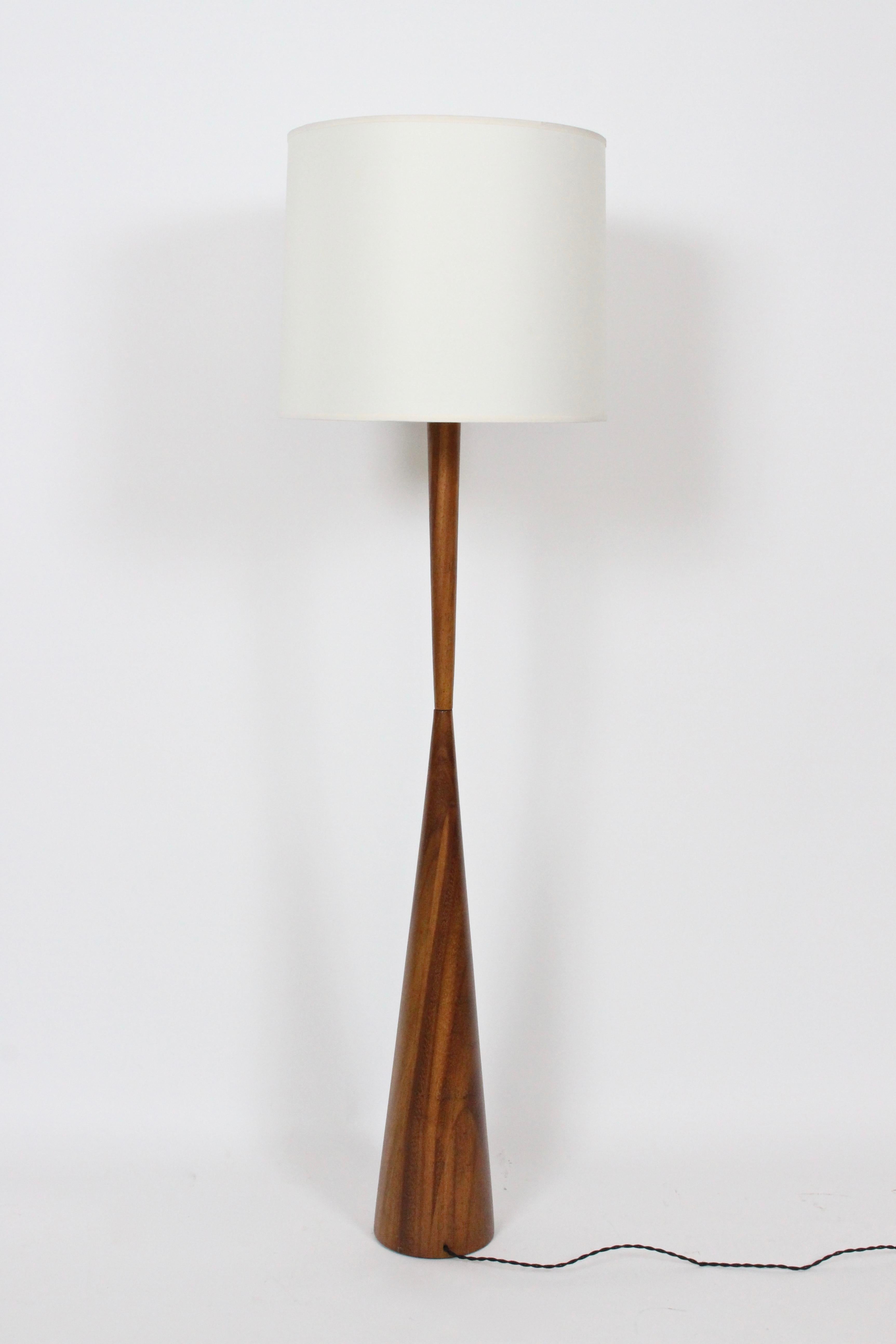 Vintage American Mid Century American Phillip Lloyd Powell style slim solid walnut reading floor lamp. Slender. Hourglass form. Small footprint. Shade for display only (13 H x 13 D top x 14 D bottom). 49 H to top of socket. 

 