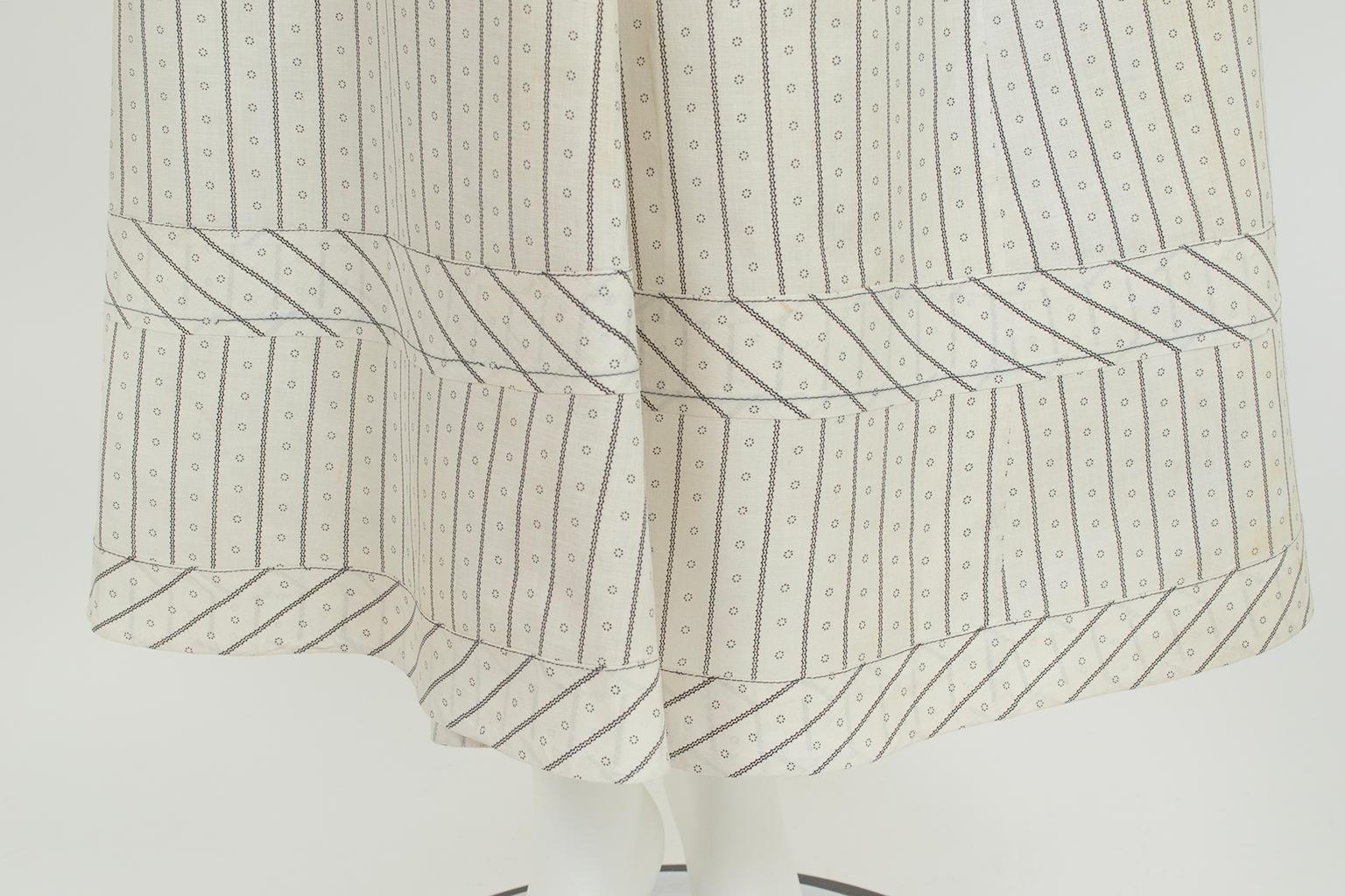A skirt that has withstood over 150 years on the planet with no loss of color, print or integrity despite having lived through winters on the Plains and washing with lye; front and back hips gently discolored from years of hand-wiping. The
