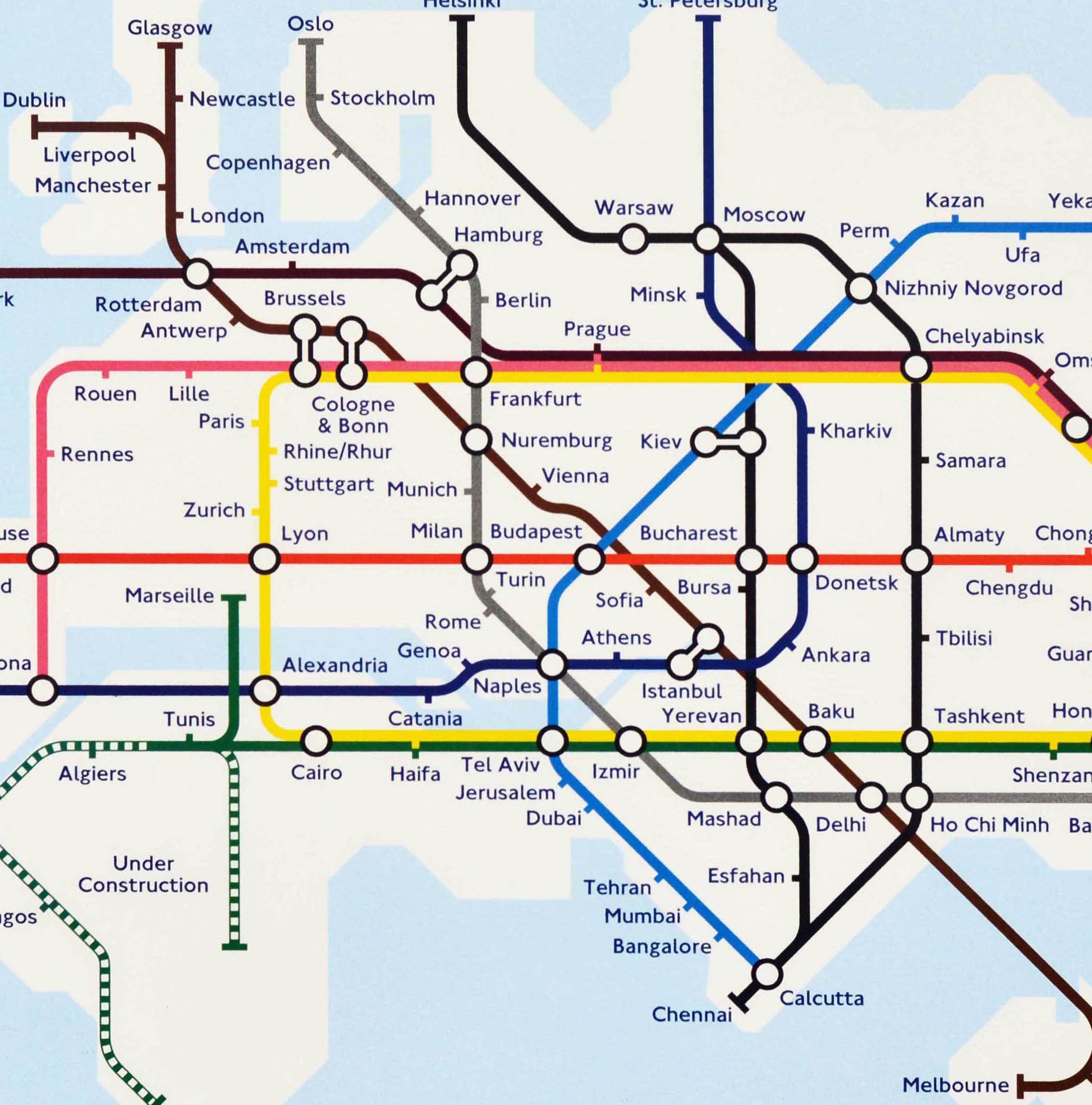 Original poster by the graphic designer and public transport cartographer Mark Ovenden (b.1963) showing routes around the world in the style of the London Underground tube map - World Metro Map. Copyright by Mark Ovenden, Clockwork Studio and