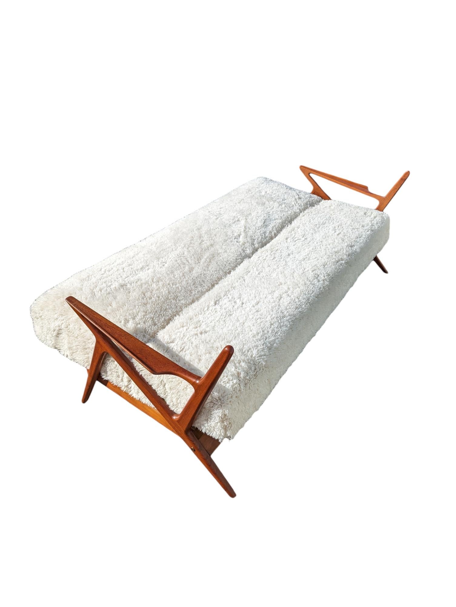 Product Description Full:
Daybed/ 3-seater ‘Model Z’ designed by Poul Jensen and produced by Selig in Denmark in 1957 newly upholstered in faux fur. This lovely 3 seater couch also doubles up as a daybed with a folding frame with the infamous