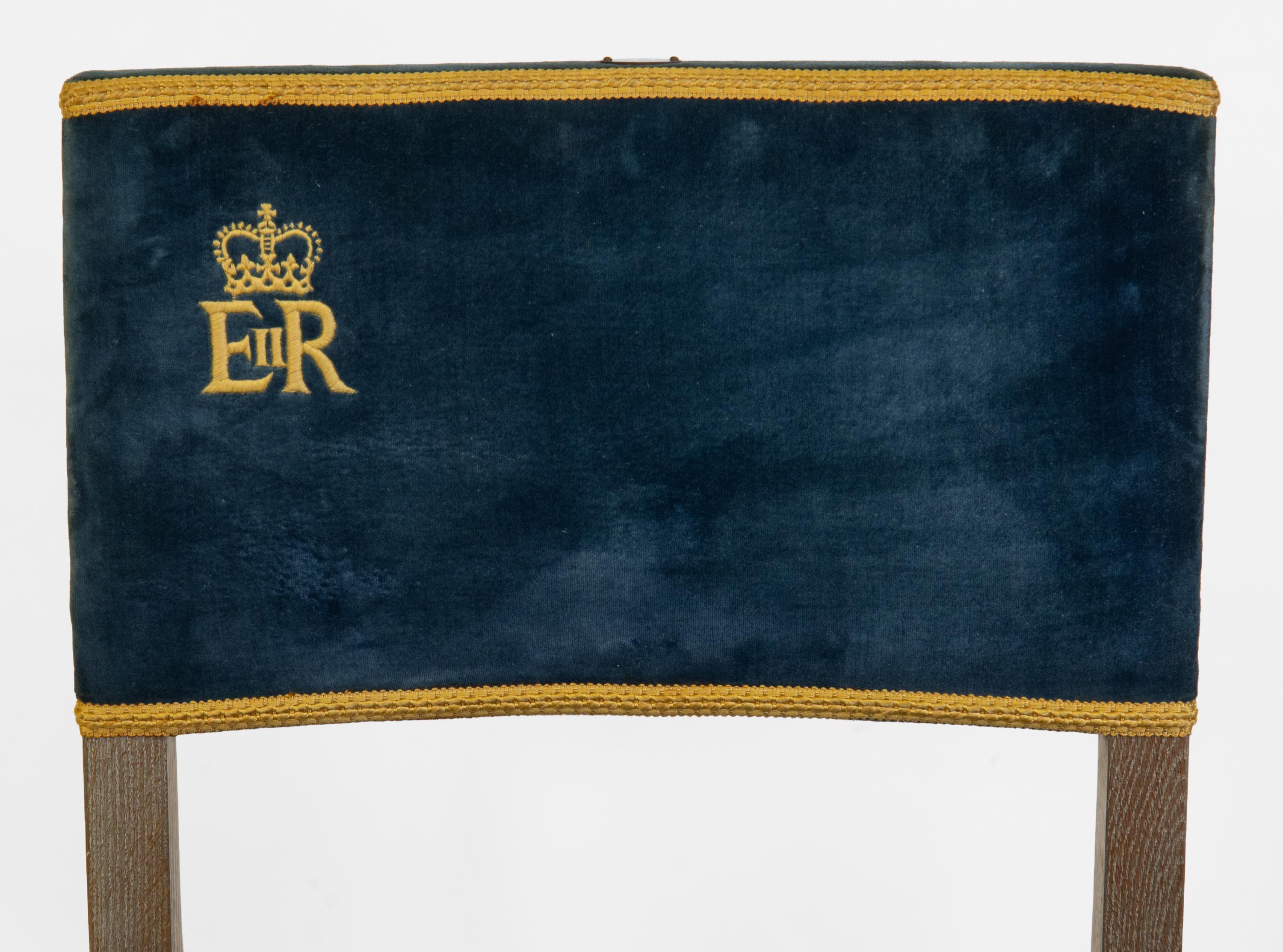 Original Queen Elizabeth II Coronation chair. 1953.

The chair is in original un-touched condition, and is an excellent example, showing very light signs of use, the velvet and braiding still with good colour. 

Made in solid English oak with silver