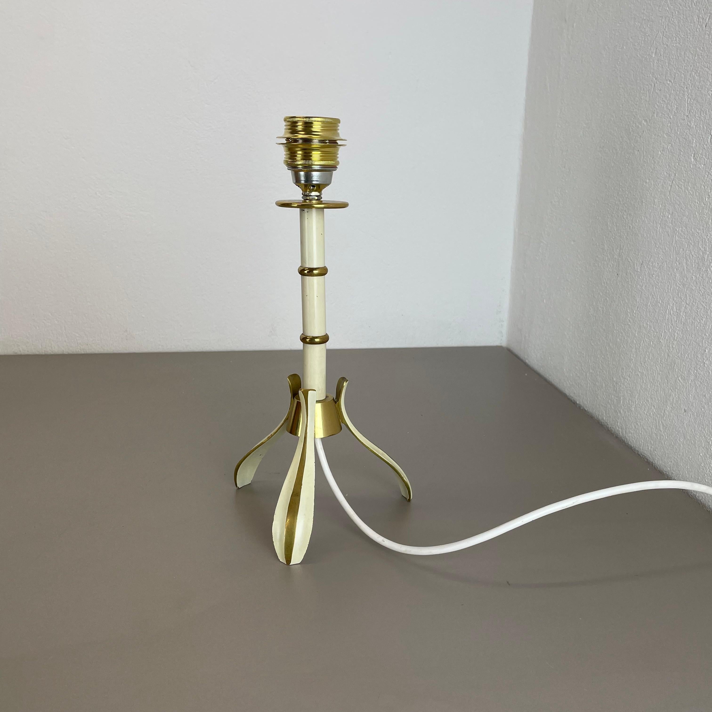 Article:

Table light


Origin:

Germany


Producer:

Vereinigte Werkstätten München


Age:

1950s






This original vintage Minimalist table light was produced in the 1950s in Germany by Vereinigte Werkstätten München. It