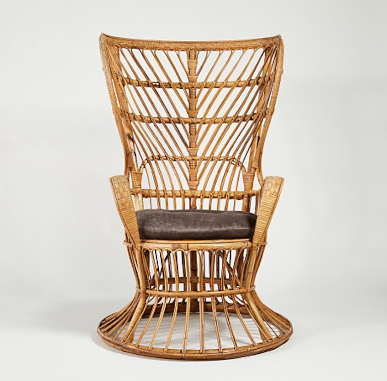 High-back rattan lounge chair rattan designed by Leo Carminati and manufactured by Casa e Giardino, circa 1948, Italy. Complete original with a beautiful patina. 