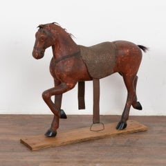 Cheval original en bois sculpté et peint en rouge, Suède vers 1890