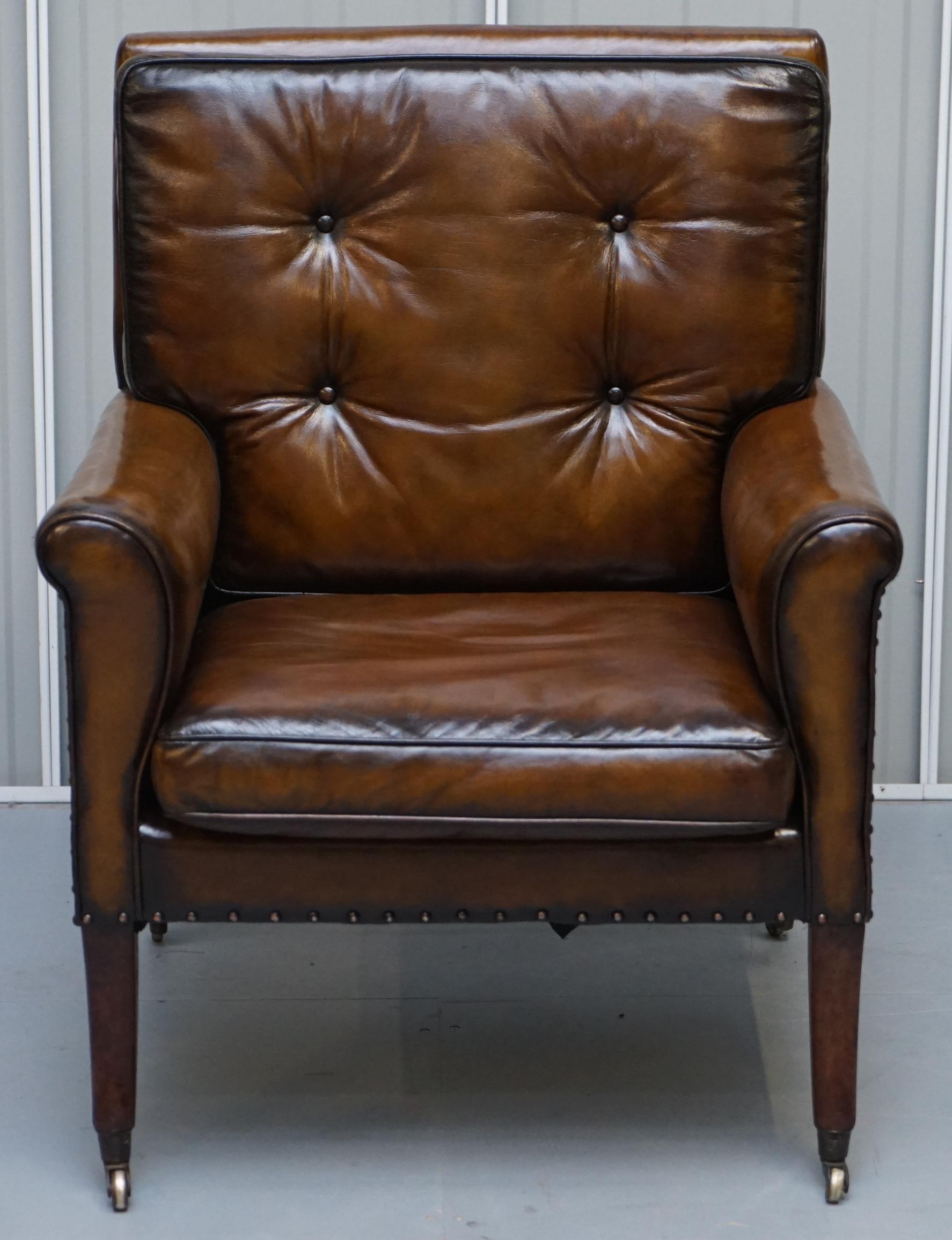 We are delighted to offer for sale this stunning fully restored Regency gentlemen's club brown leather armchair 

This is the only chair of its type I have ever seen, its original Regency as mentioned, the frame is solid mahogany and very ornately