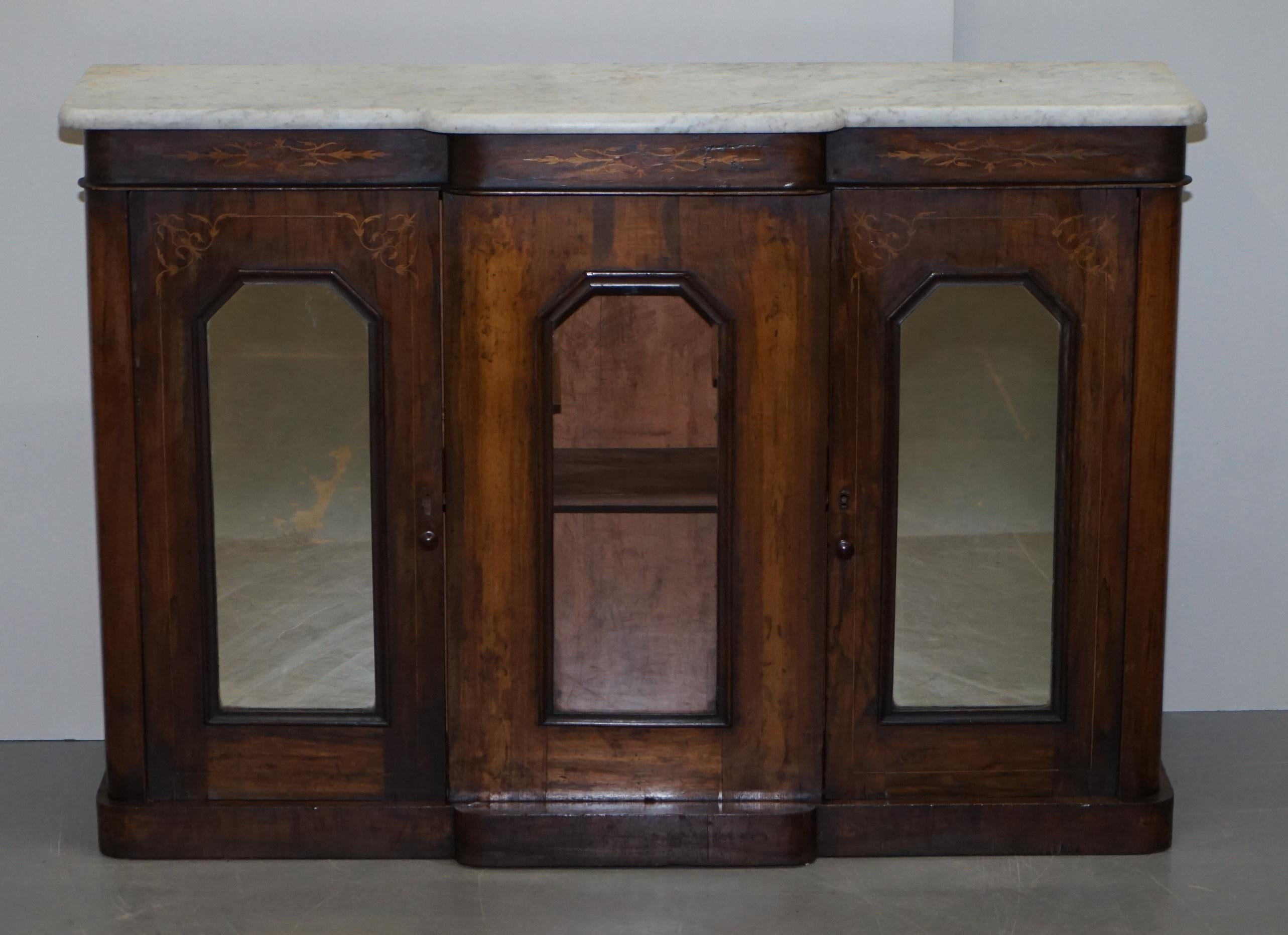 We are delighted to offer for sale this rare original Regency walnut and marble sideboard credenza 

A very good looking decorative and collectable cabinet. This piece was extremely popular in the early 19th century, this is Italian with Marquetry