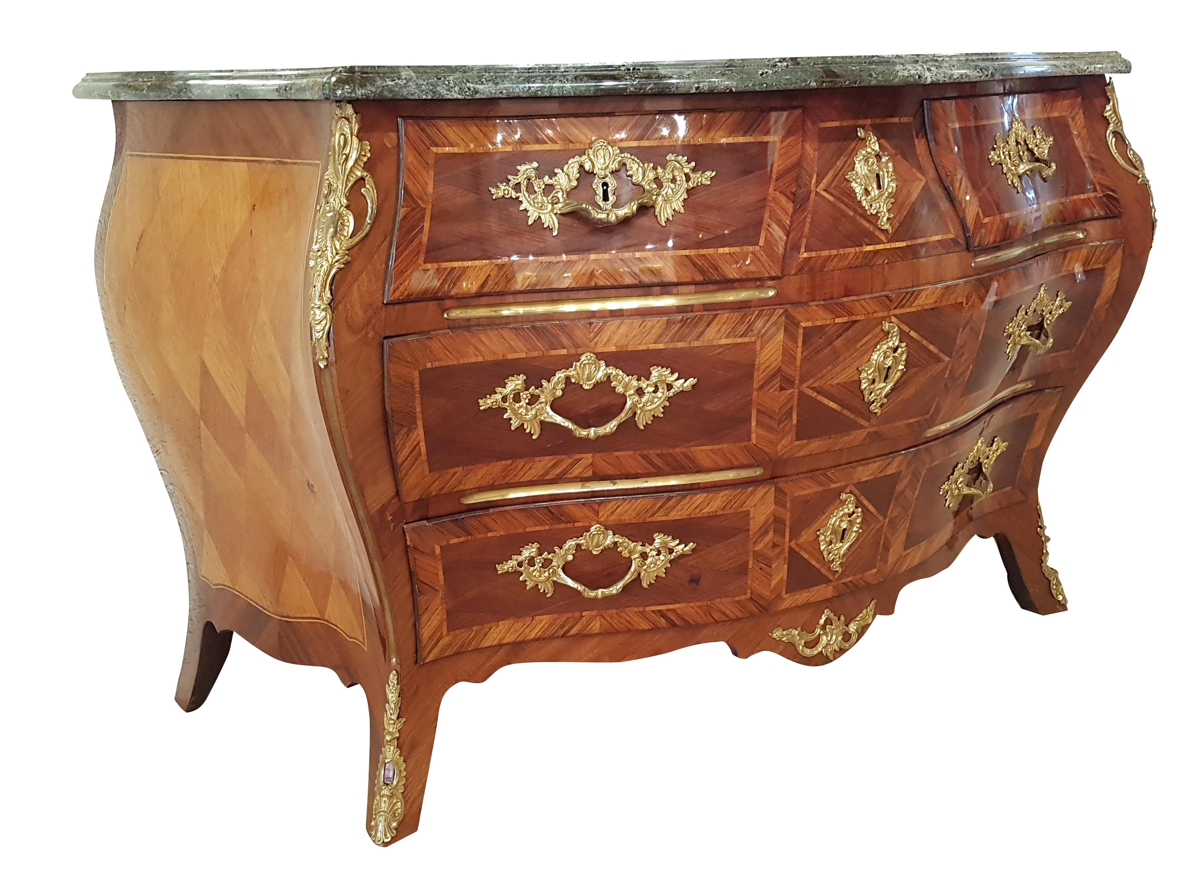 An original commode from the Rococo Era made of walnut/palisander and other precious woods veneered on softwood. The commode has been completely restored preserving the patina and the surface has been polished by hand with shellac. The buyer gets a