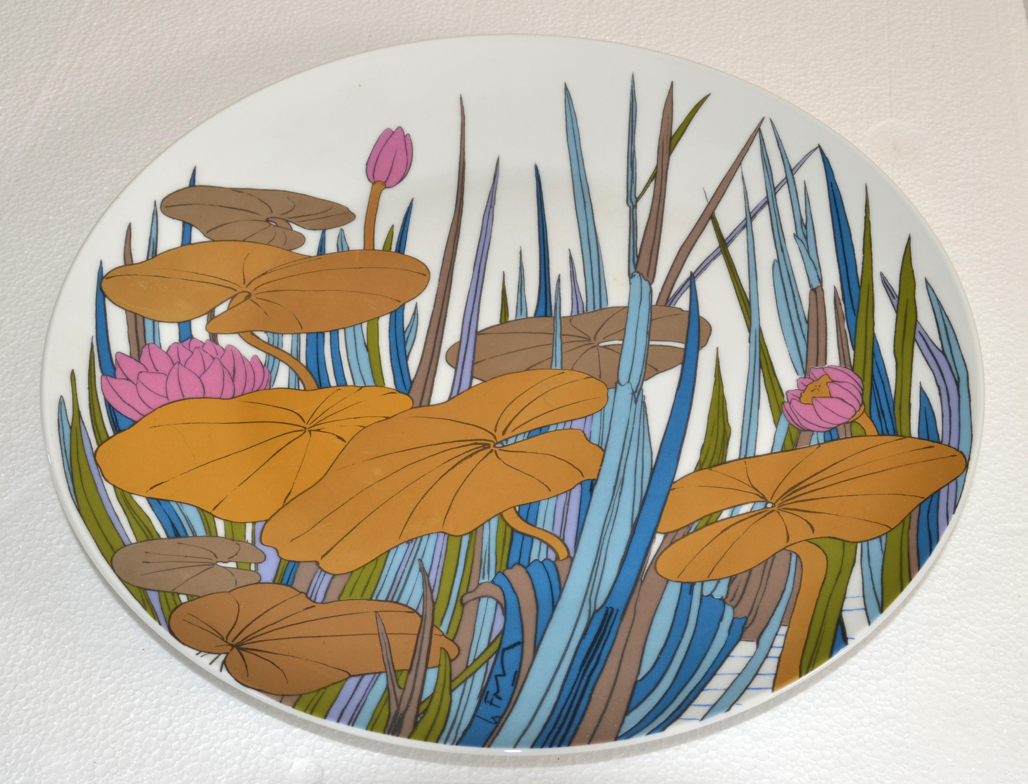 Striking original Rosenthal porcelain hand painted flower plate designed by Wolfgang Bauer and made in Germany for Studio-Linie.
This 100 Years Anniversary Collectable Wall Plate features multi-color floral branch outlined in gold.
Marked Rosenthal