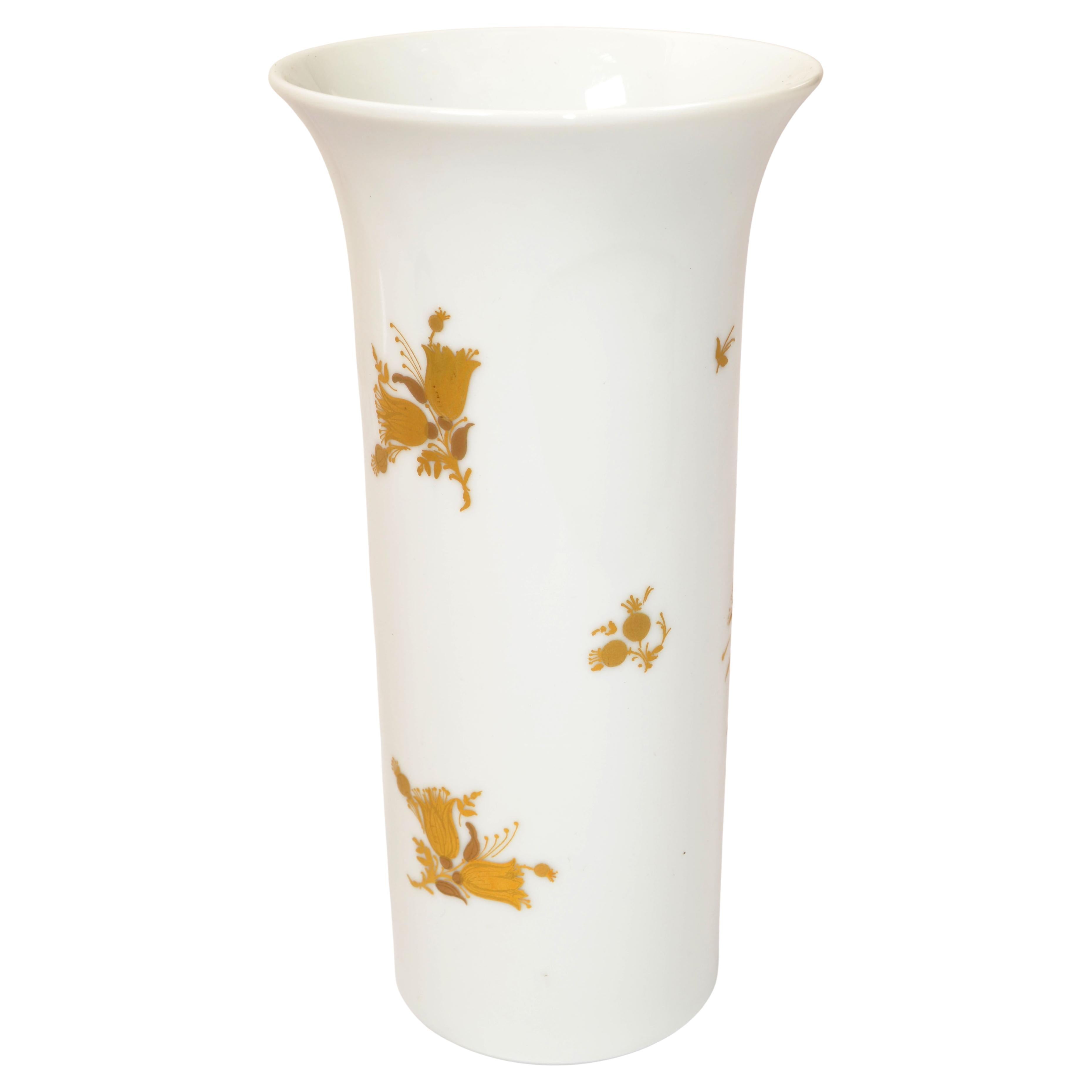 Striking original Rosenthal porcelain hand painted flower vase attributed to Bjorn Wiinblad and made in Germany by Rosenthal.
The vase features multi floral blossoms in Gold Leaf. 
Marked Rosenthal Germany at the base and numbered 26.
Limited Art by