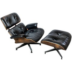 Original Rosewood Eames Lounge Chair and Ottoman in Black Leather
