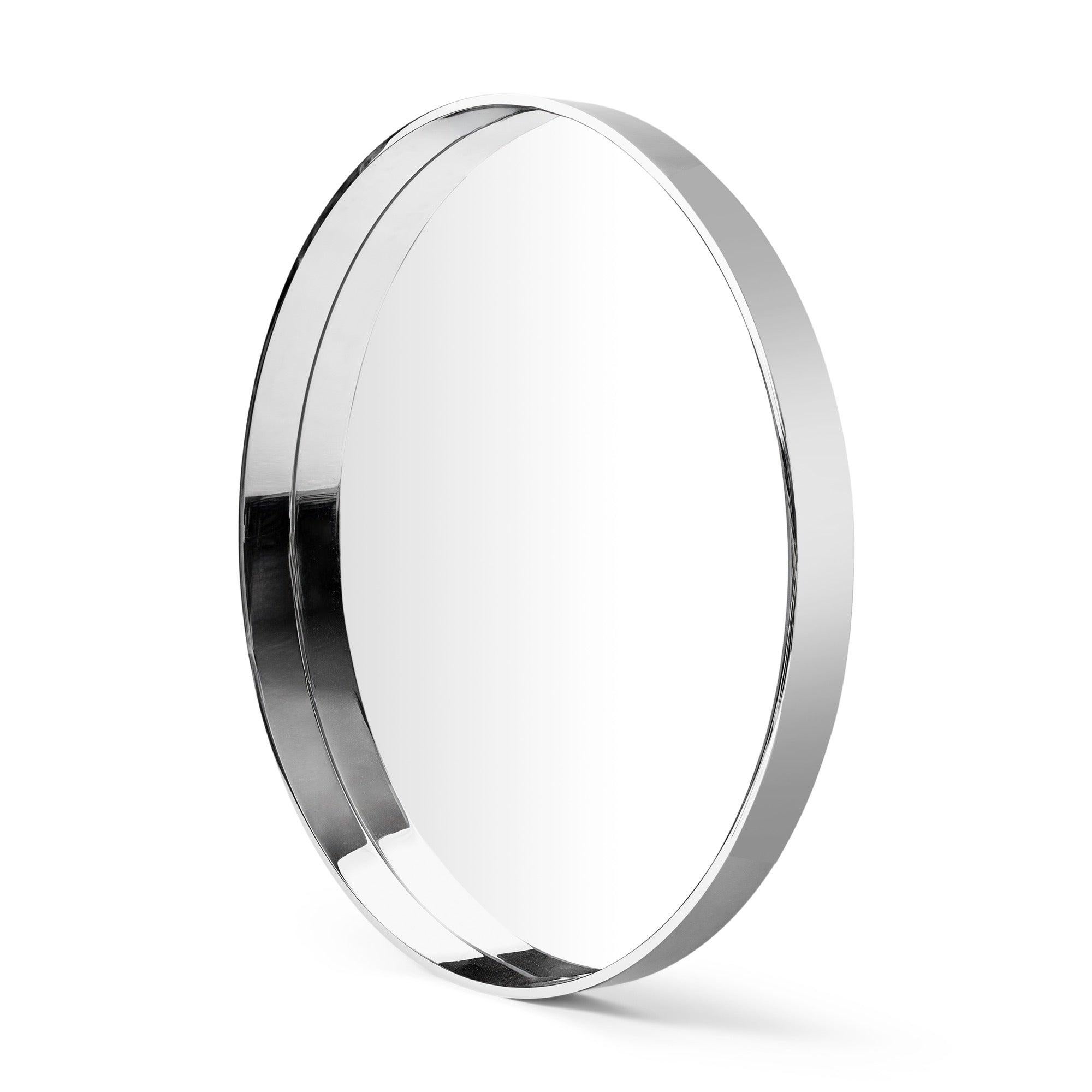 Un miroir original avec un cadre en acier inoxydable poli aux bords profonds. ?