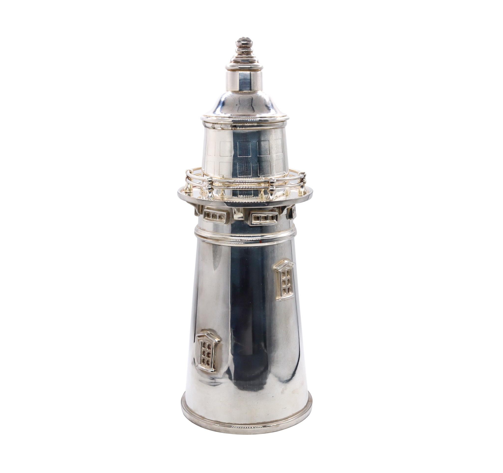 Art-Deco Cocktail Shaker in the shape of a lighthouse.

Very decorative and unusual piece made in Sheffield, United Kingdom, during the late deco period, circa 1930. This cocktail drinks shaker was crafted in the shape of a lighthouse and all the