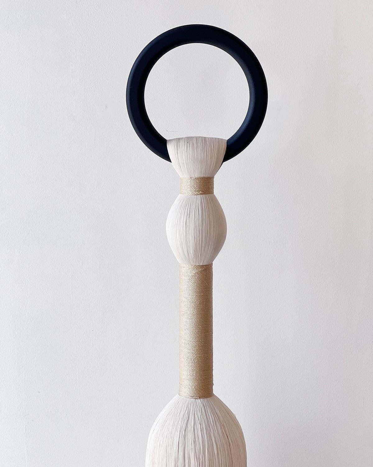 The Señora Space Jewelry Floor Sculptures offer an attractive and unique standing sculpture decor piece that combine organic modern style with natural cotton macrame inspired styling. Our pieces are large enough to be a focal point of home decor and