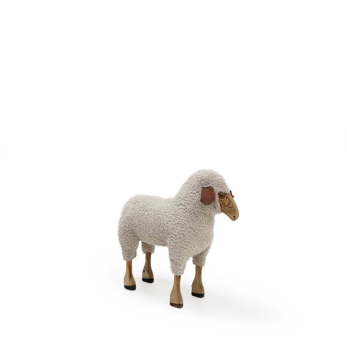 A stool in the form of a sheep.. Designed by Hans-Peter Krafft and completely handmade in Germany during the 1980s.

This sheep sculpture adds a friendly touch to any space, it can be used as a stool or simply a decorative element. 

