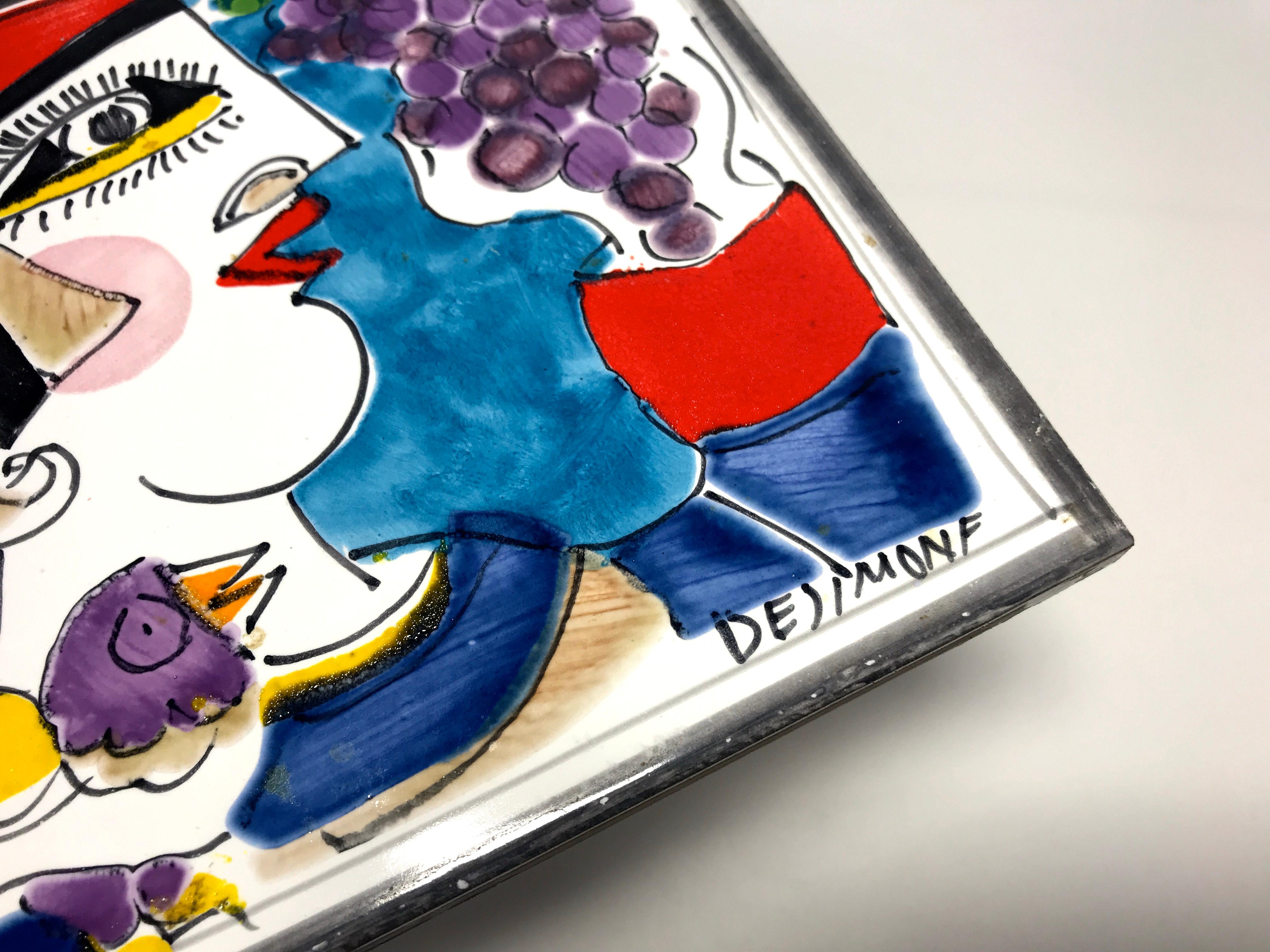 Signed by Giovanni Desimone, this original hand painted ceramic tile of a man with grapes and bird is full of color and vibrancy - typical of Giovanni's work,
Signed to front by Giovanni Desimone,
circa 1960s
Measure: 15 centimetres square
In