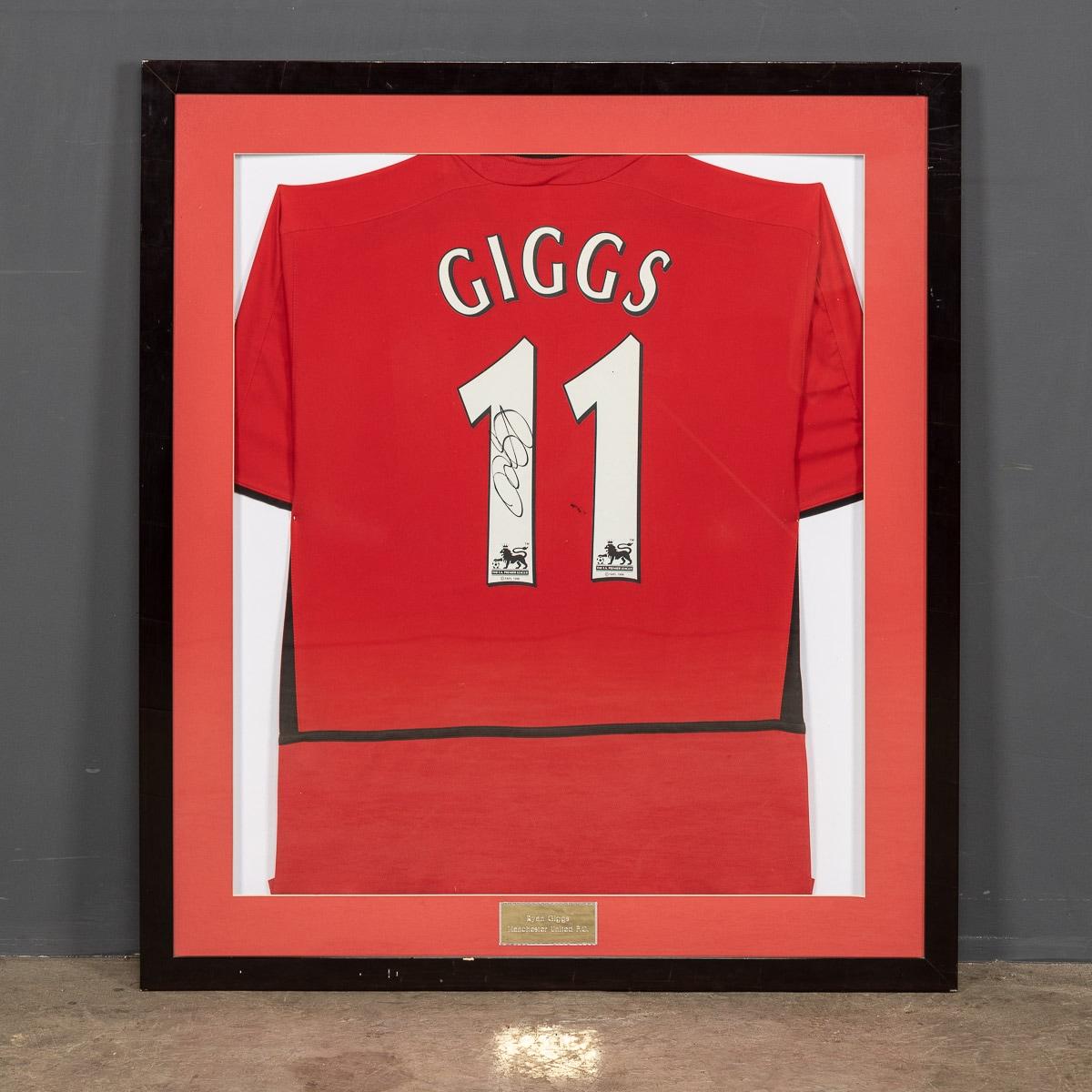 A Manchester United football shirt bearing the number eleven famously worn by Ryan Giggs during his career playing at Manchester United. Framed and signed in the first digit this piece of Ryan Giggs memorabilia would hang proudly on any Manchester