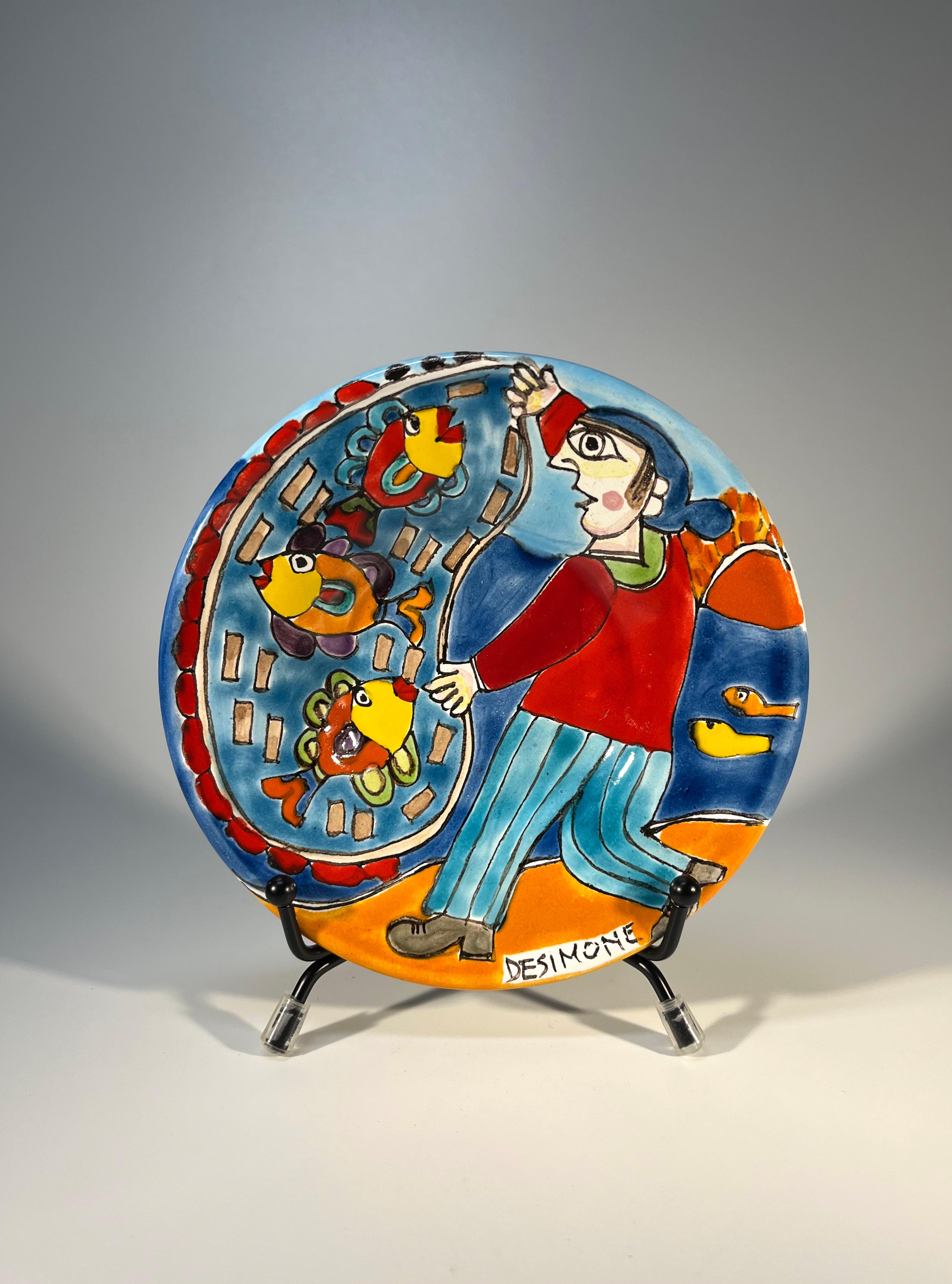 Original and signed by Giovanni DeSimone, this hand-painted little plate is full of colour and life depicting a busy fisherman
Small in size, huge on personality - Giovanni at his best
The condition of this piece is exceptional 
Signed to front by