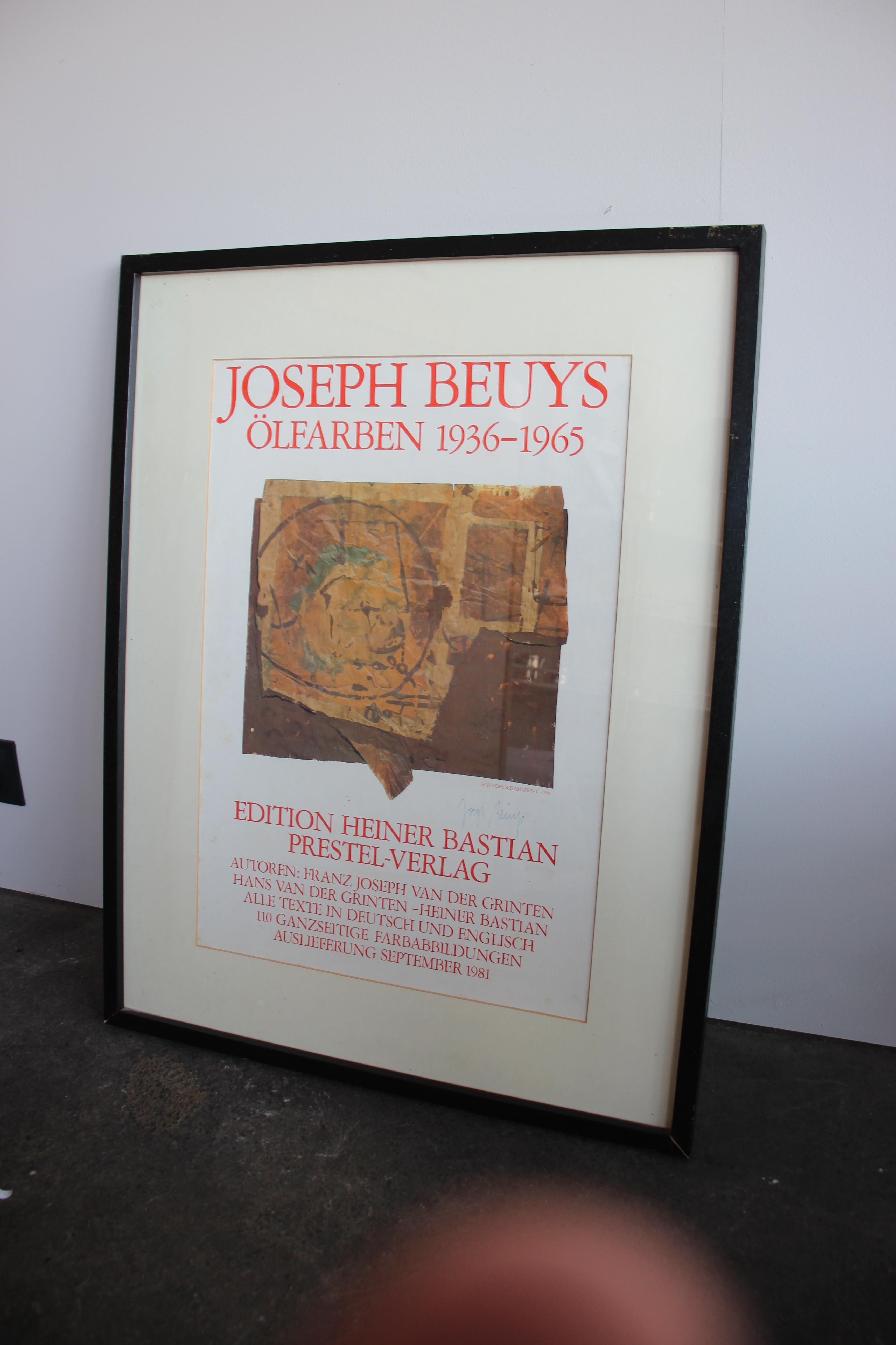 Original advertisement poster from 1981 for a book on Beuys oil paintings from 1936 to 1965. Signed by Beuys himself. 
 This poster is an offset print with an artist's signature in the middle right area. It was signed with a blue pen. The picture