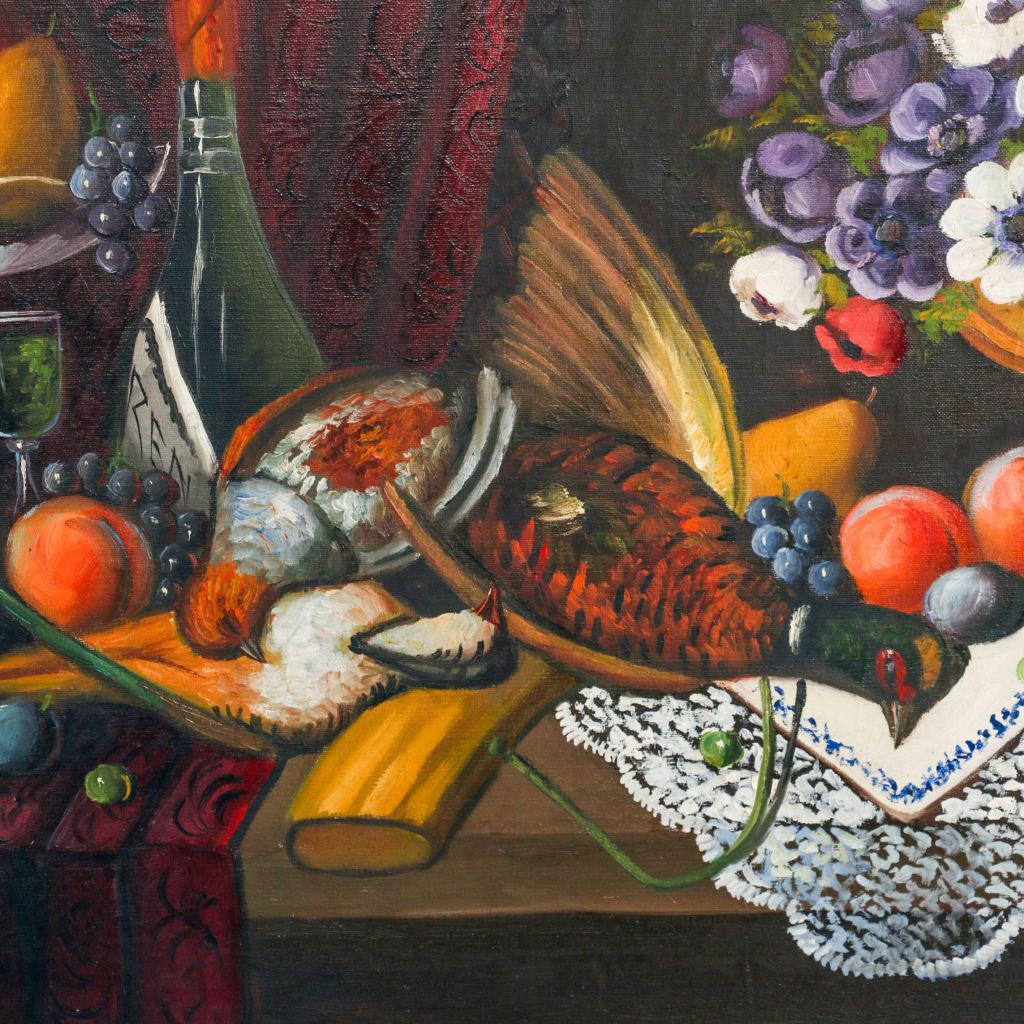 Note the bright colors of blue, red, white, and orange in the lavish display of fruit and flower spread across the long table in this vibrant oil on canvas still life painting. This large horizontal canvas is mounted in a painted wood frame and