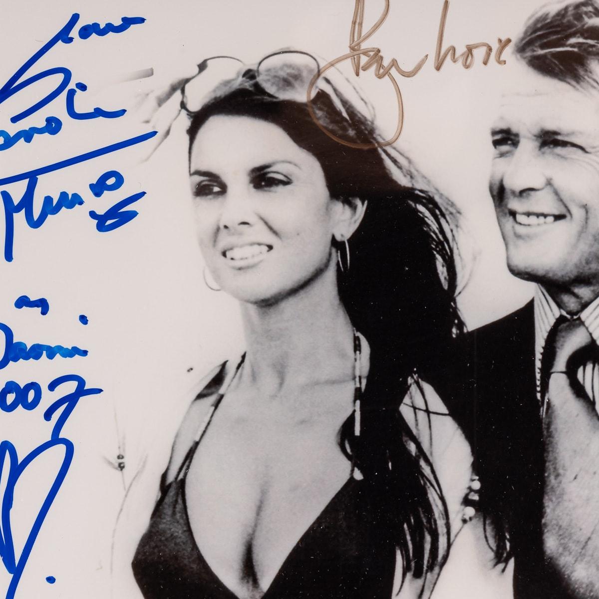 20th Century Original Signed Photo By Roger Moore & Caroline Munro For Sale