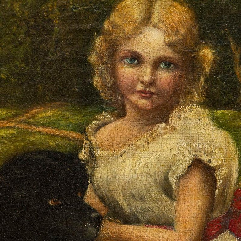 This delightful small painting portrays a young blue eyed girl with blonde hair sitting on a green lawn with her two dogs. Notice her red bonnet/hat (which matches the red sash of her white dress) lying casually at her side as well. The landscape