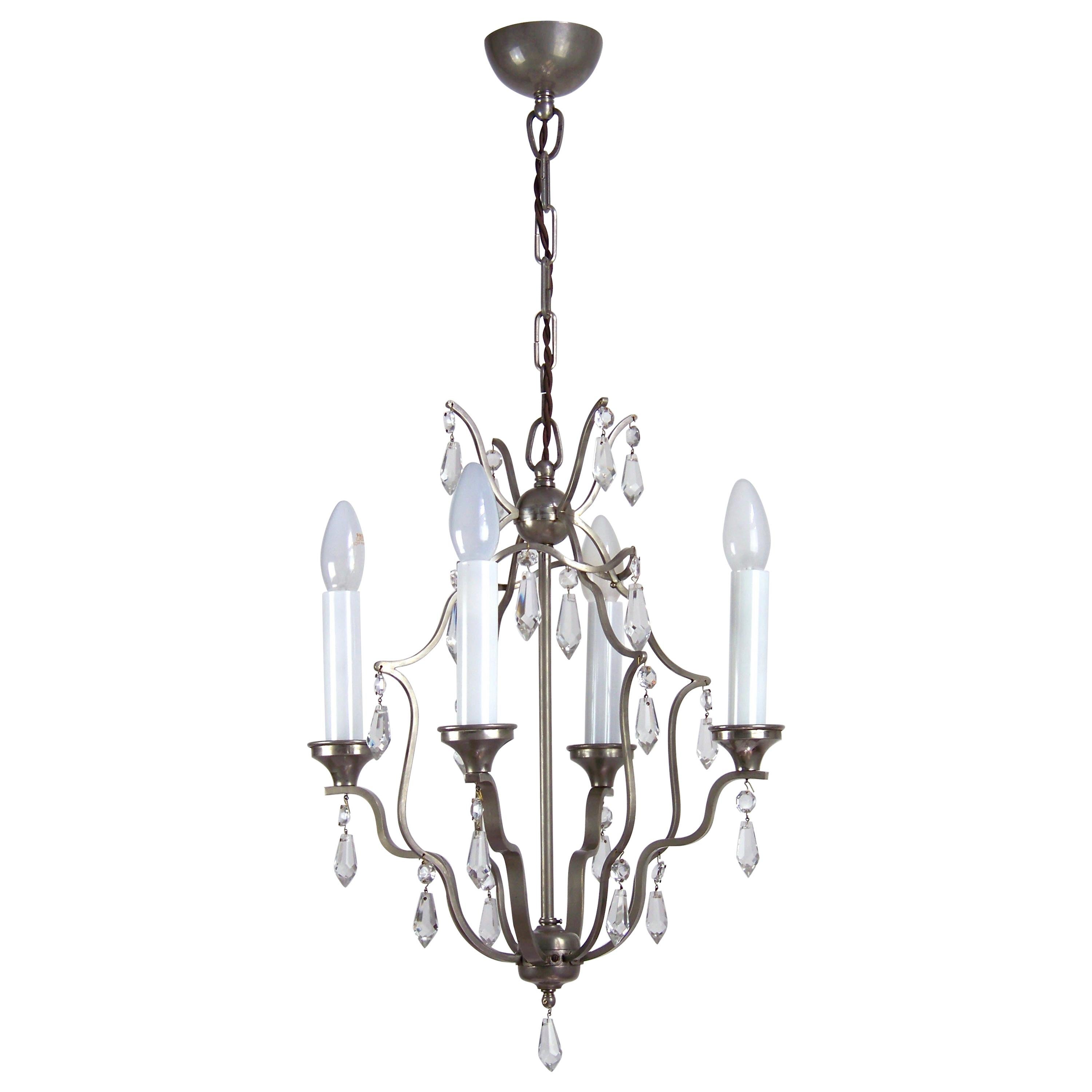 Chrome chandelier with glass trimmings, 1920ca For Sale