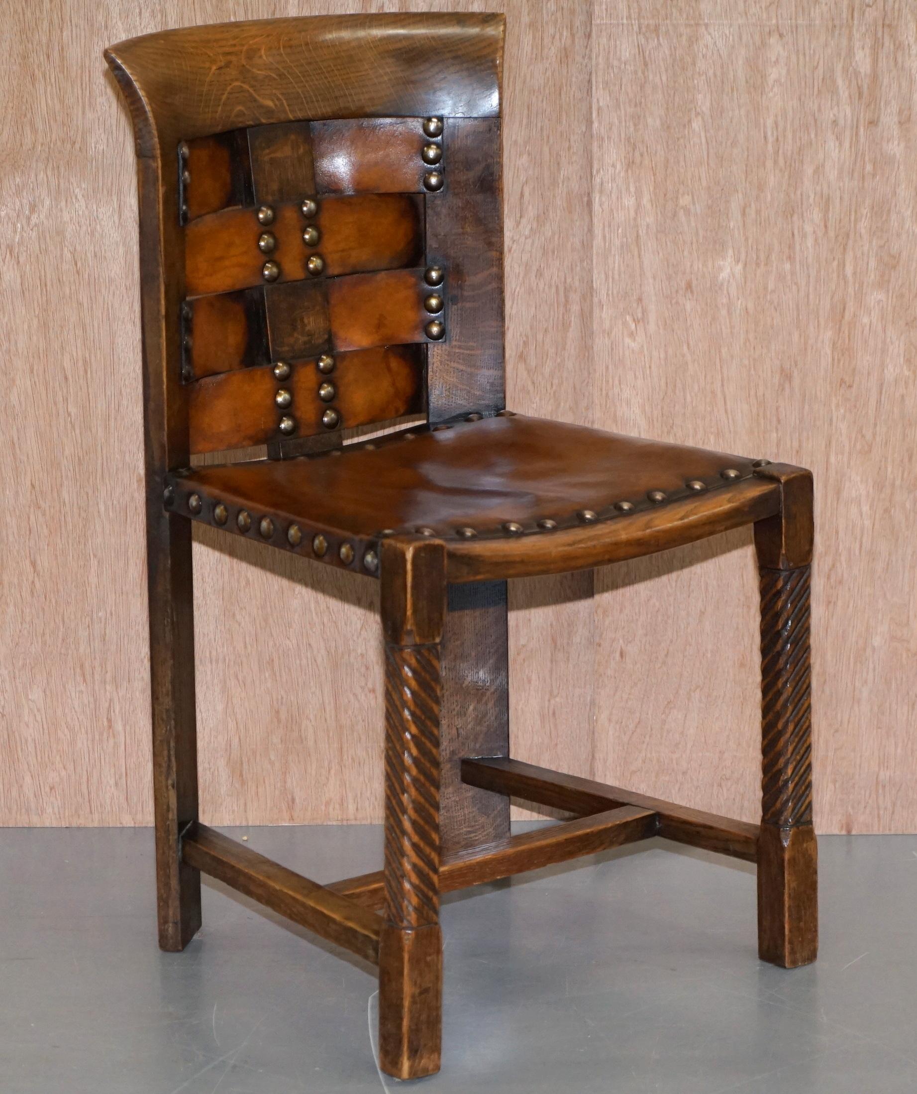 We are delighted to offer for sale this very rare original suite of four George Henry Walton oak and woven leather hand studded Arts & Crafts chairs 

I have never seen a set of four before, they are very rare, the timber patina is sublime, the