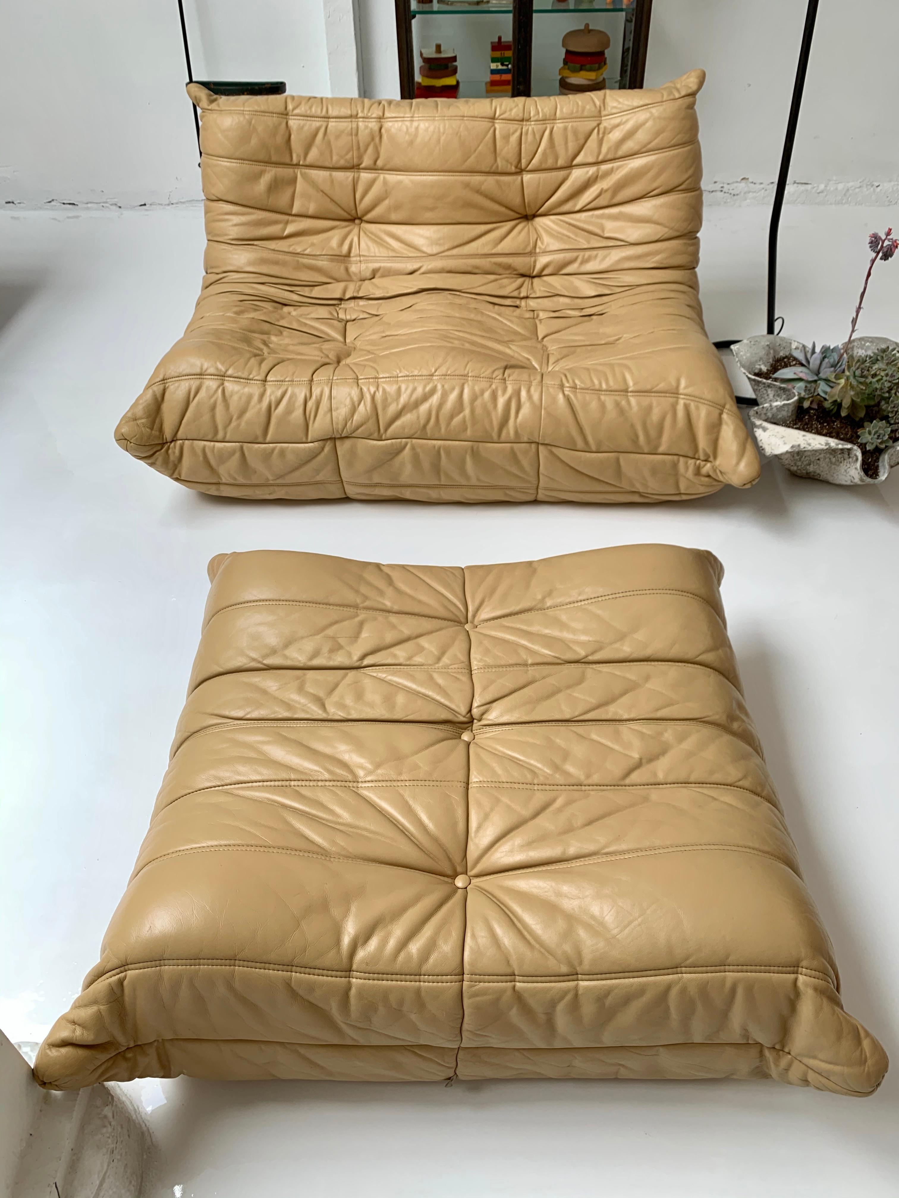 Rare vintage leather Togo loveseat sofa by Michael Ducaroy for Ligne Roset. Original leather in very rare color. Terribly comfortable. Labels still attached. Chair is in very good condition with excellent patina. Professionally cleaned and color