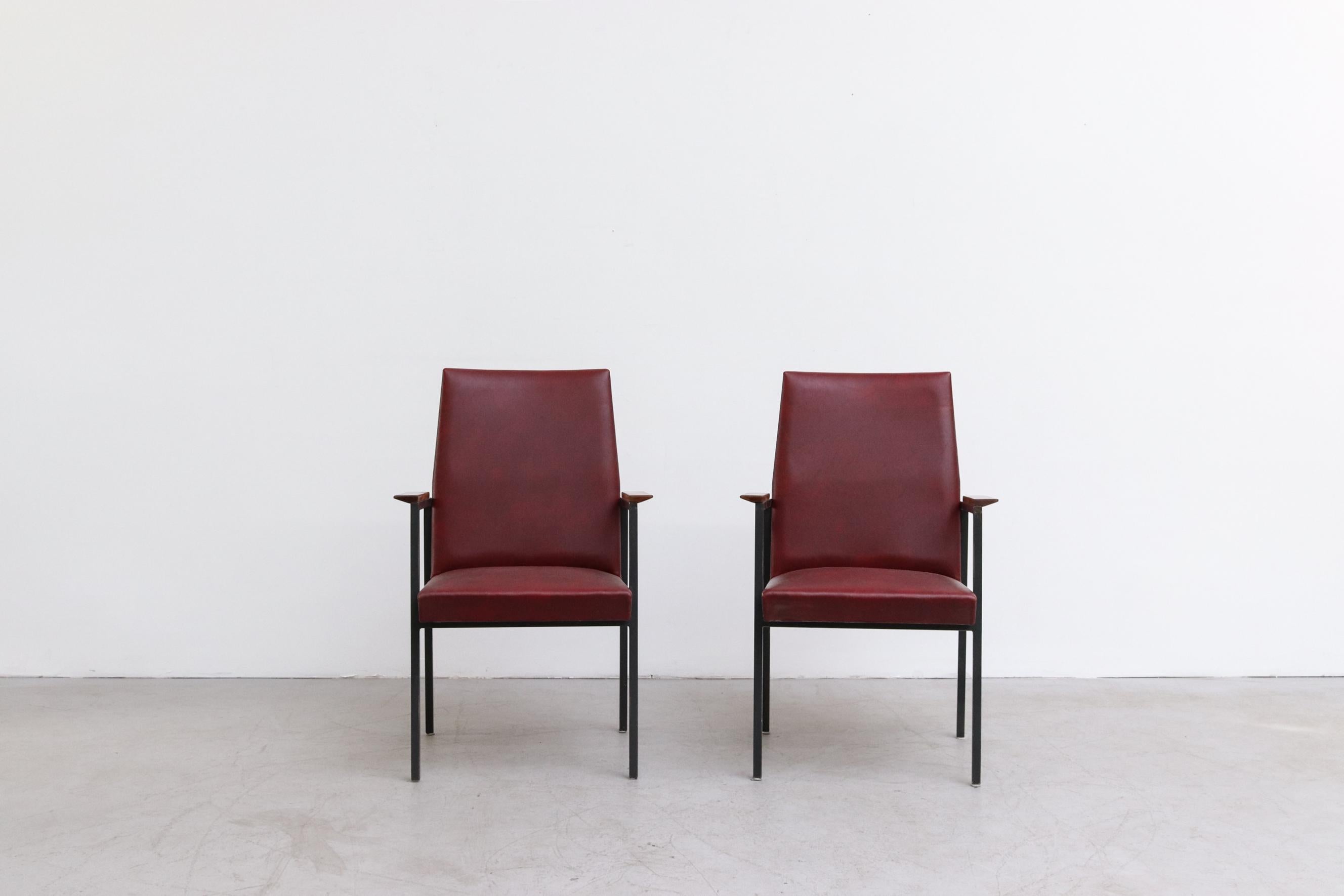Mid-Century Modern Original Tijsselling Arm Chairs with Burgundy Skai Upholstery and Teak Armrests For Sale