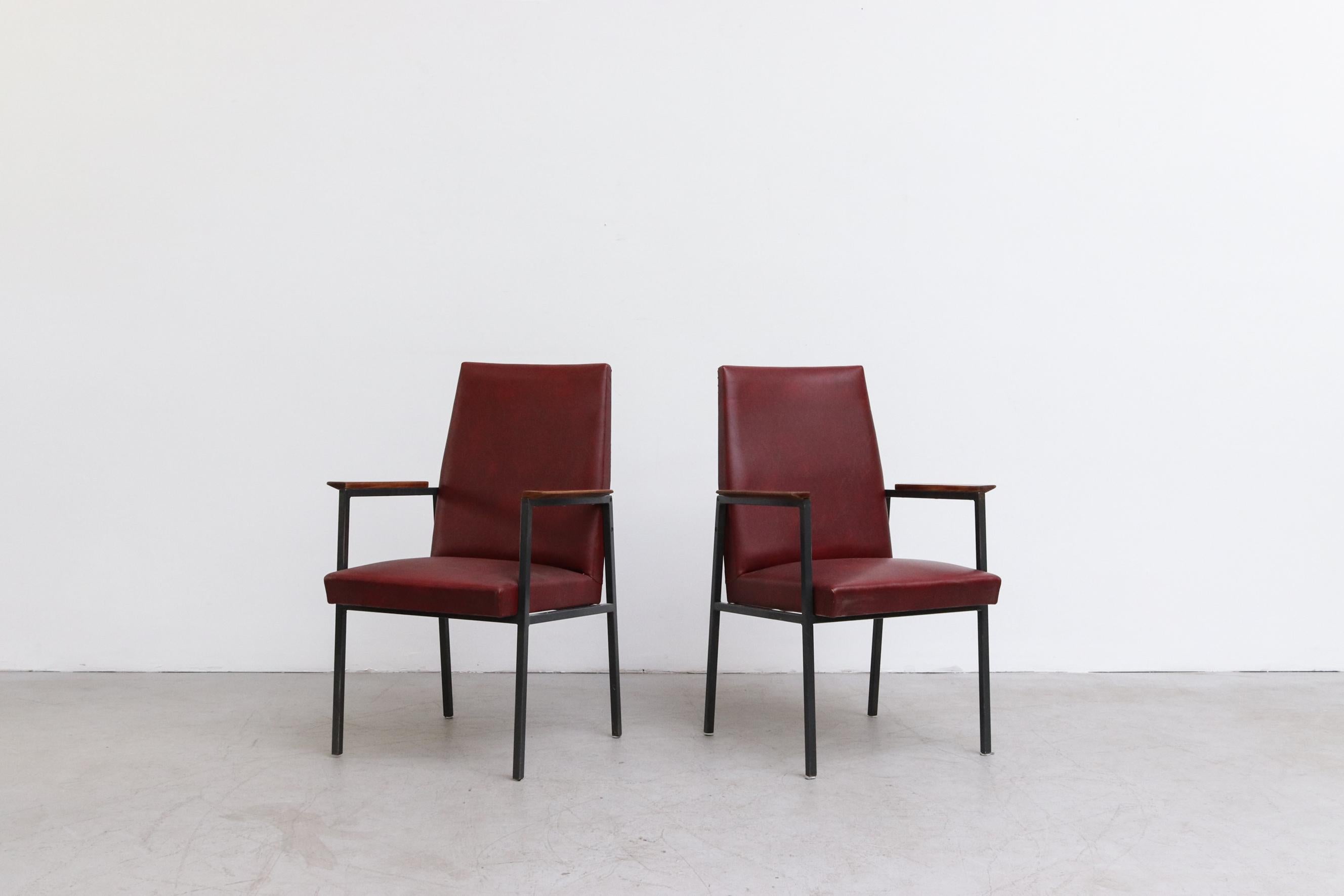 Dutch Original Tijsselling Arm Chairs with Burgundy Skai Upholstery and Teak Armrests For Sale